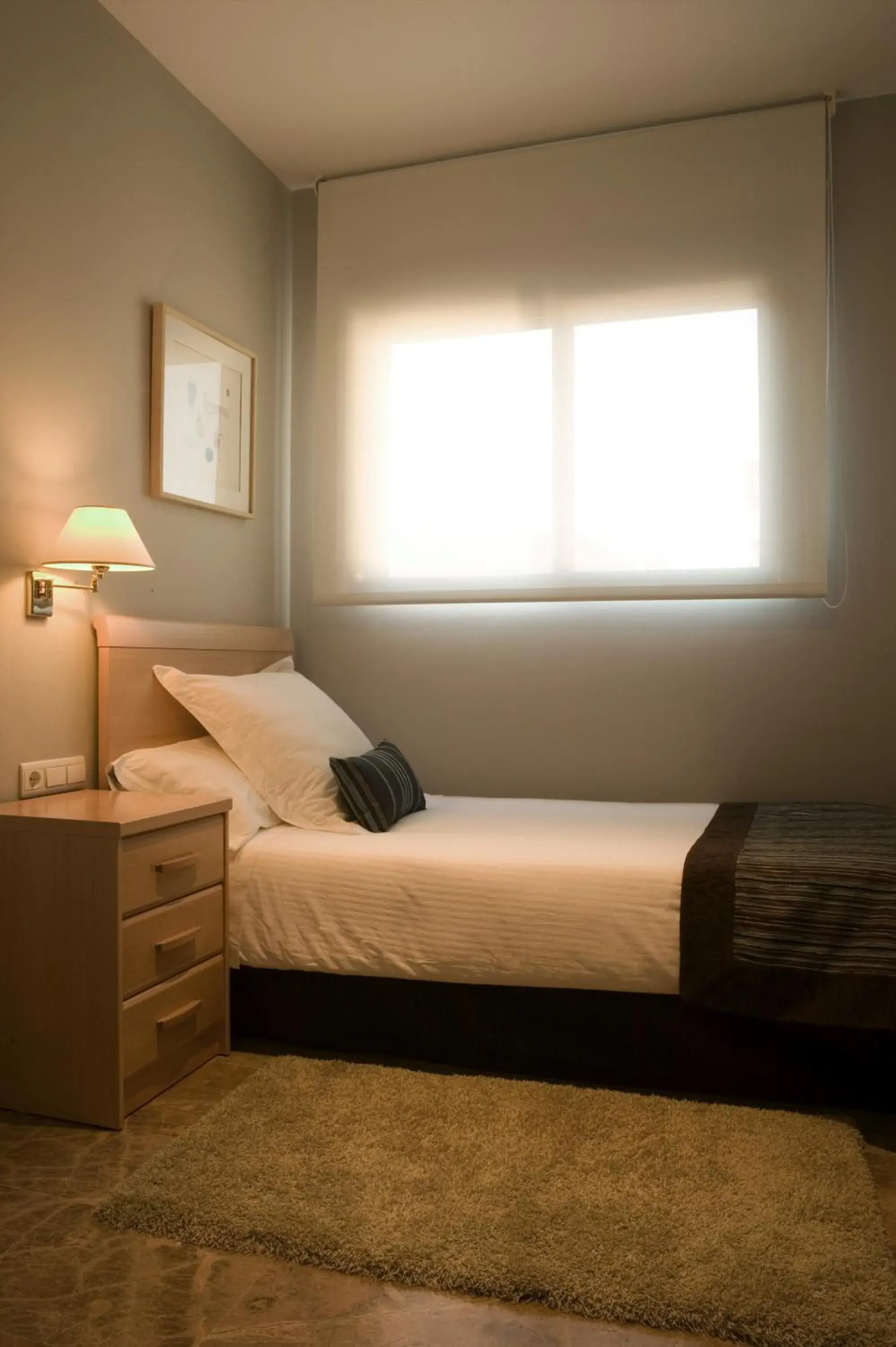 Bed in Apartamentos Plaza Picasso Bed in Apartamentos Plaza Picasso