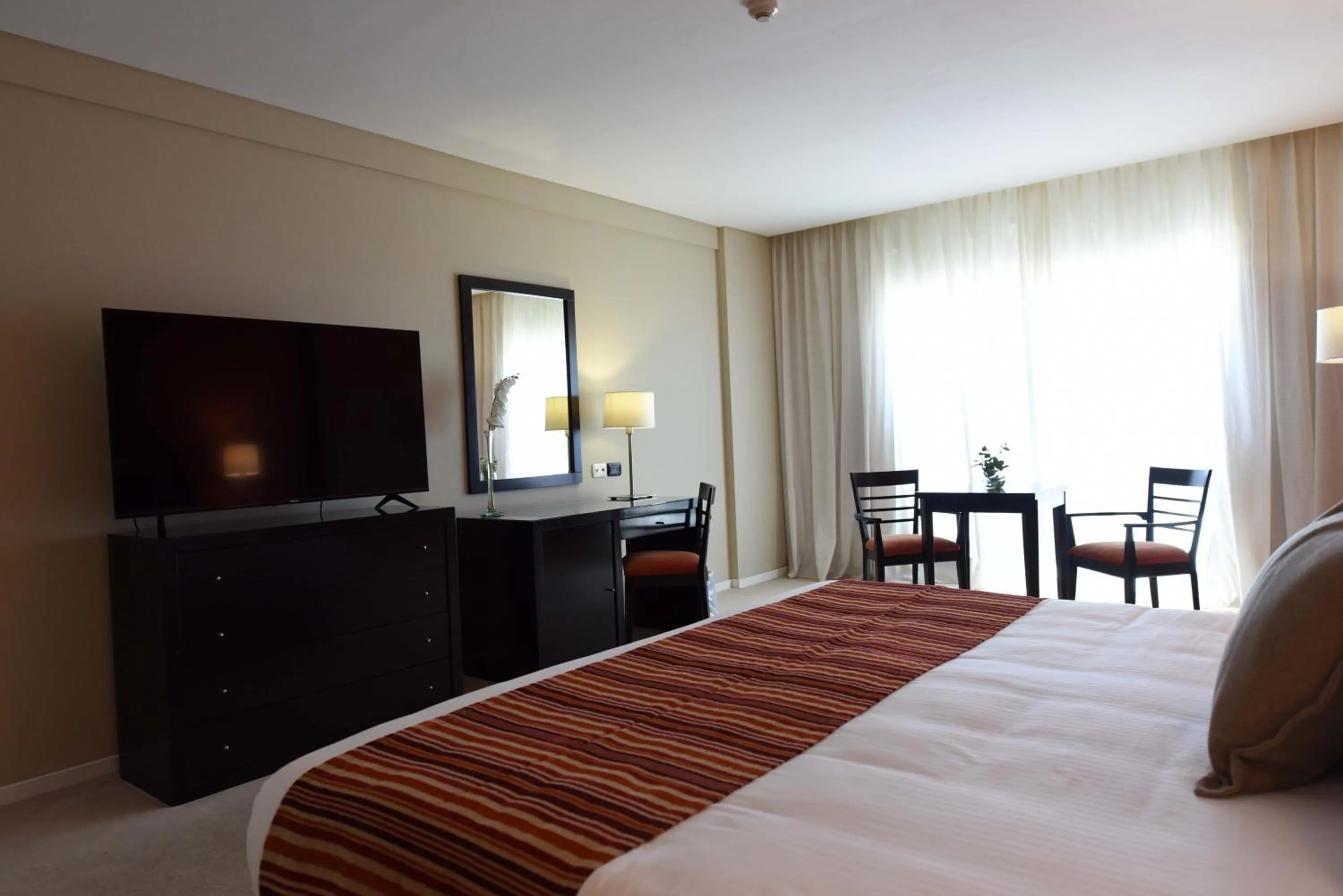 Bed in Camberland Resort & Spa Ramallo