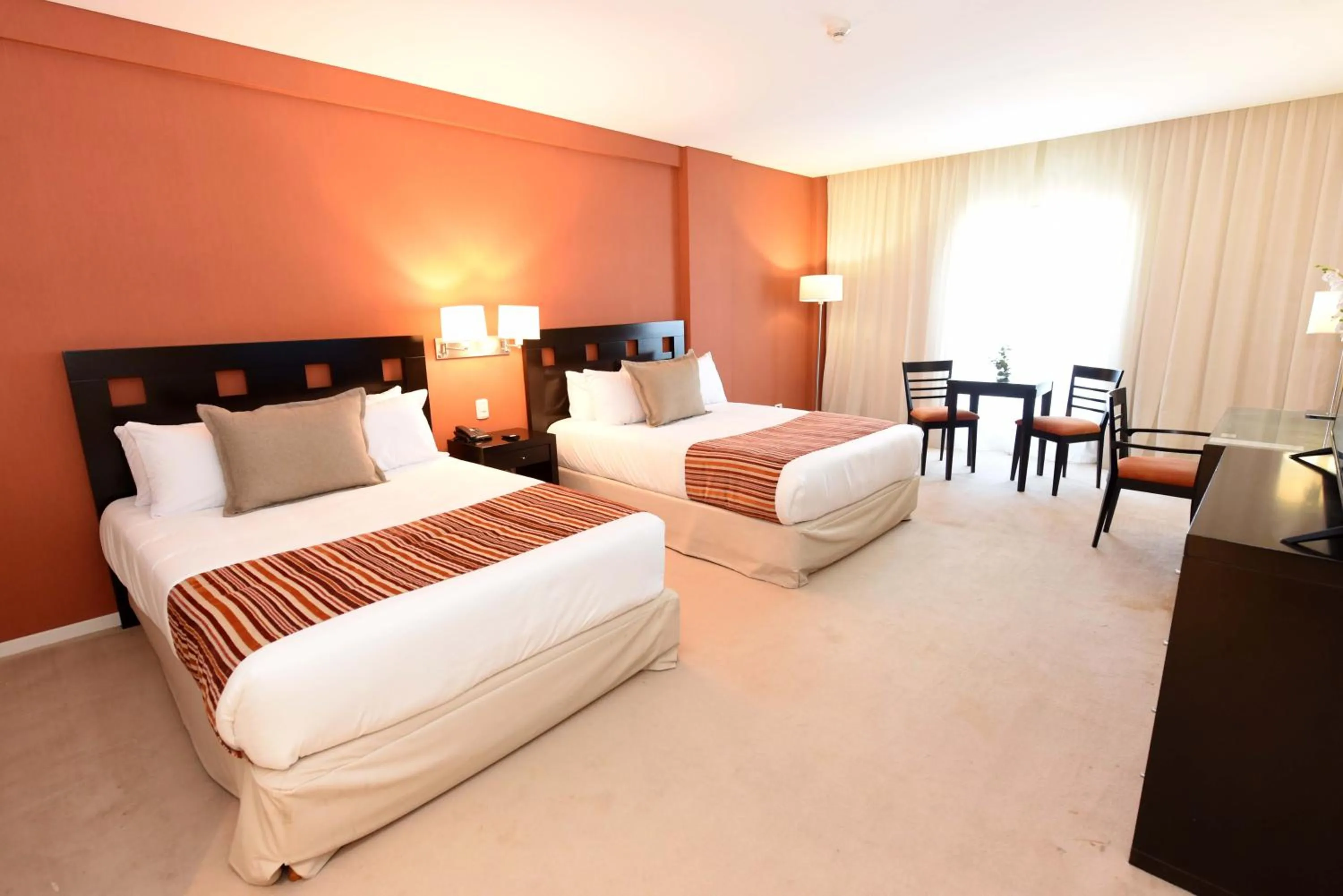 Bed in Camberland Resort & Spa Ramallo