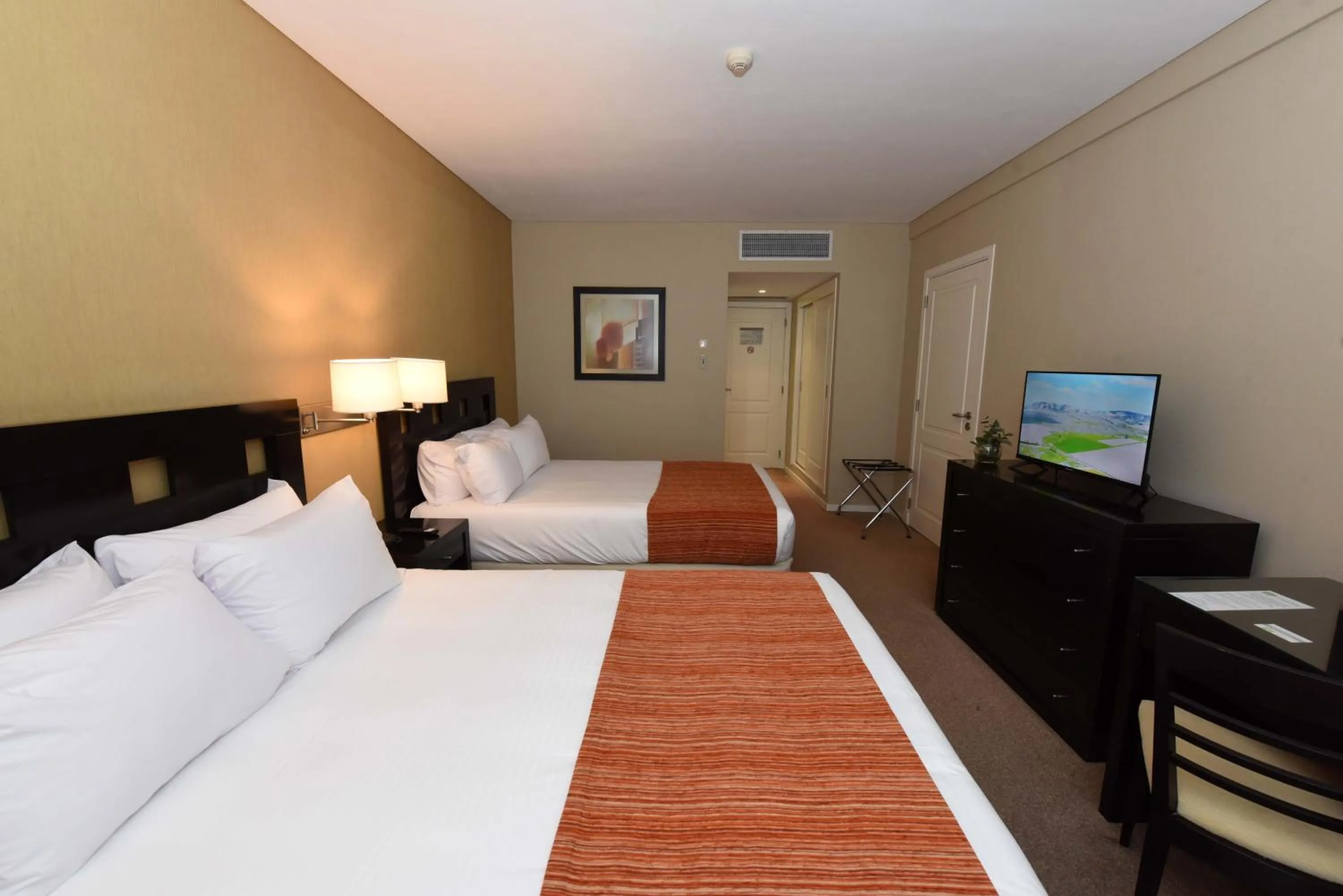 Bed in Camberland Resort & Spa Ramallo