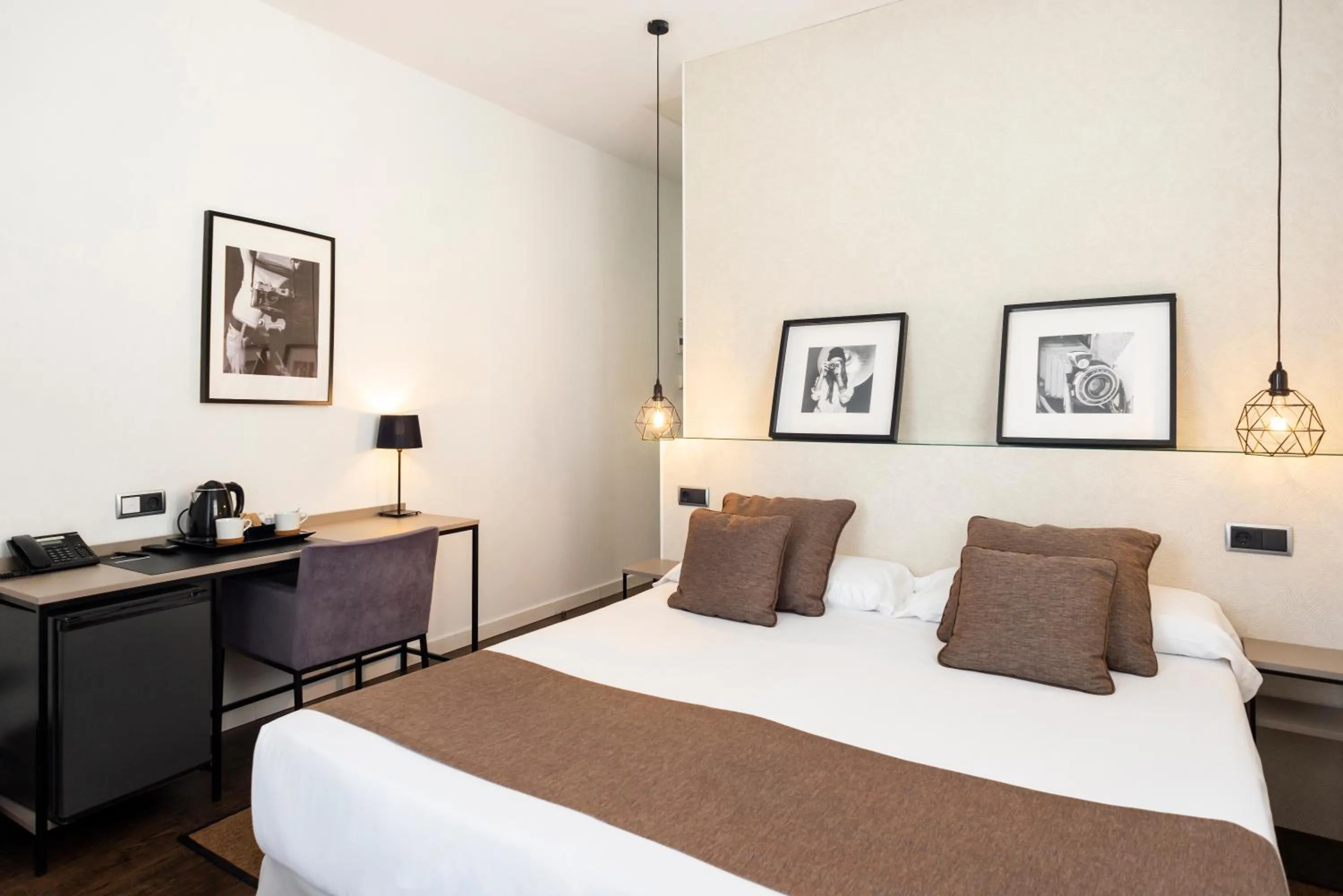 Bed in Blanq Carmen Hotel