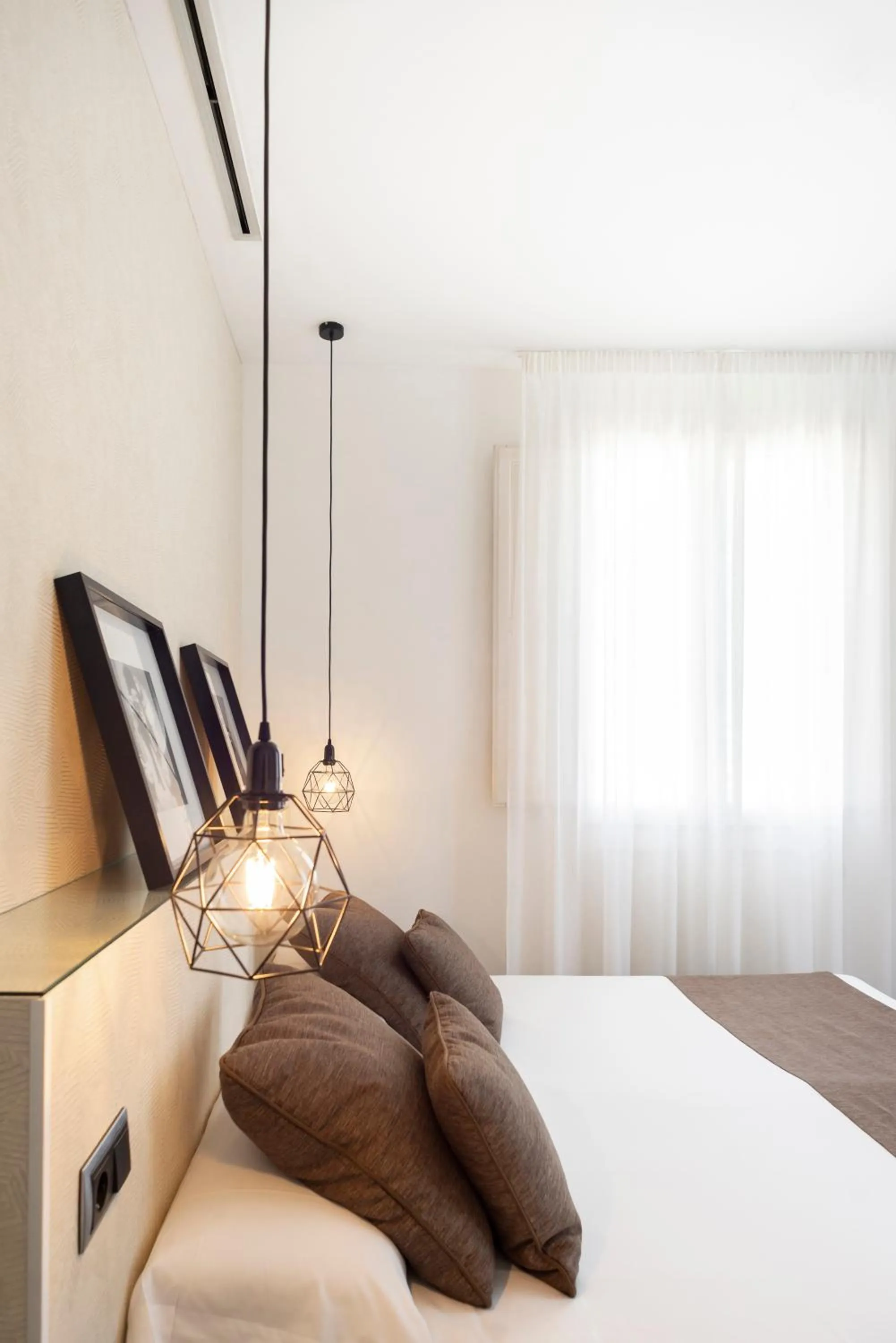 Bed in Blanq Carmen Hotel