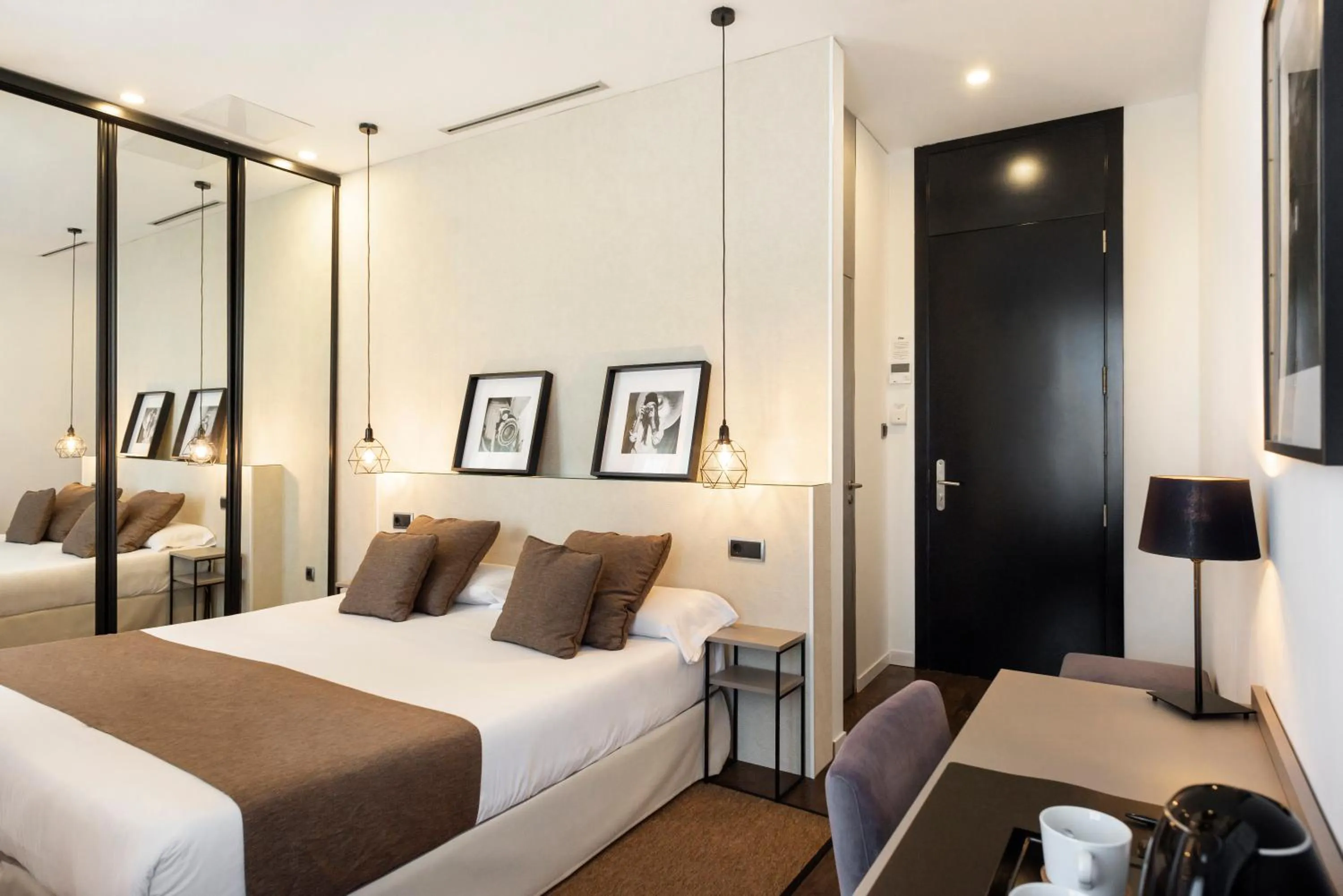 Bed in Blanq Carmen Hotel