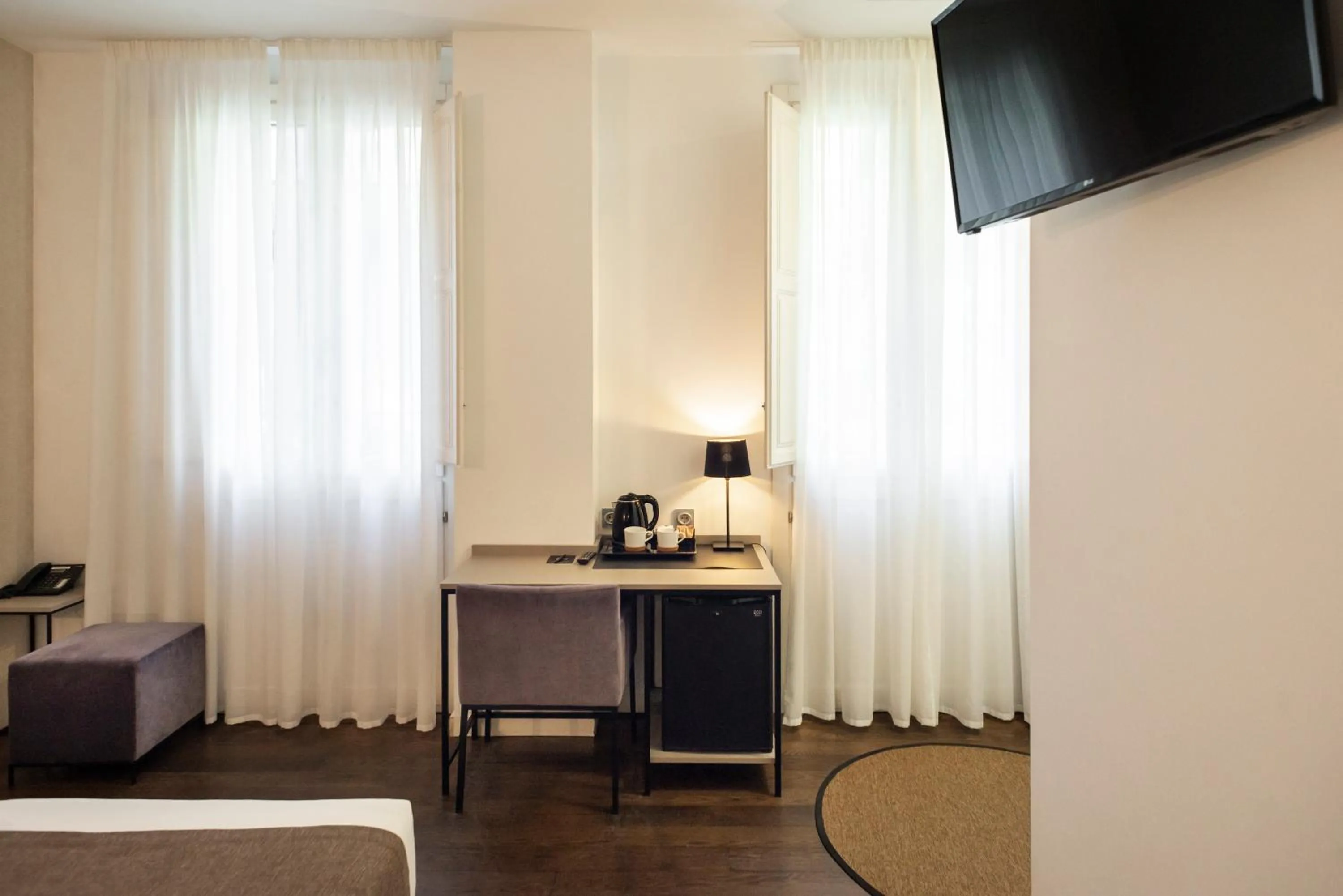 Bed in Blanq Carmen Hotel