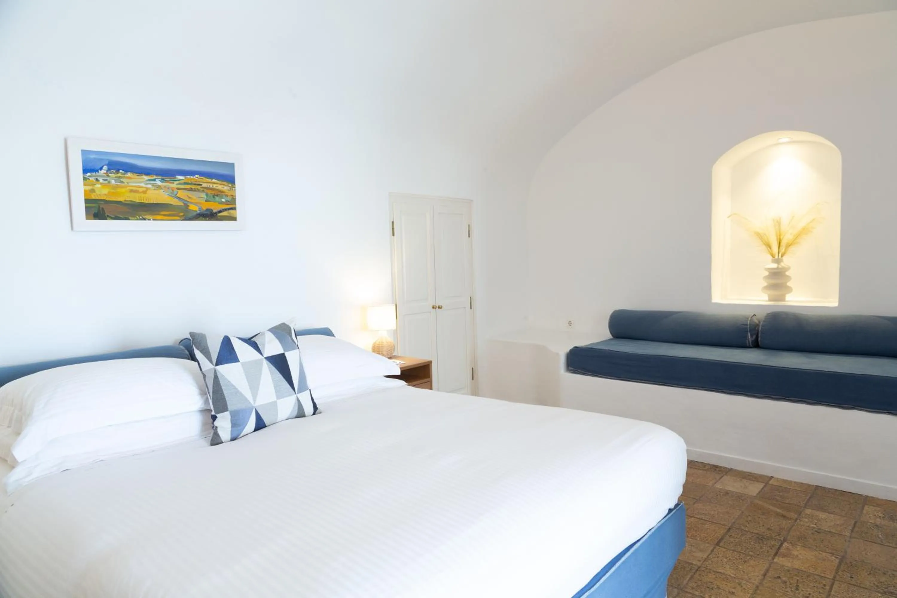 Bed in Pantelia Suites