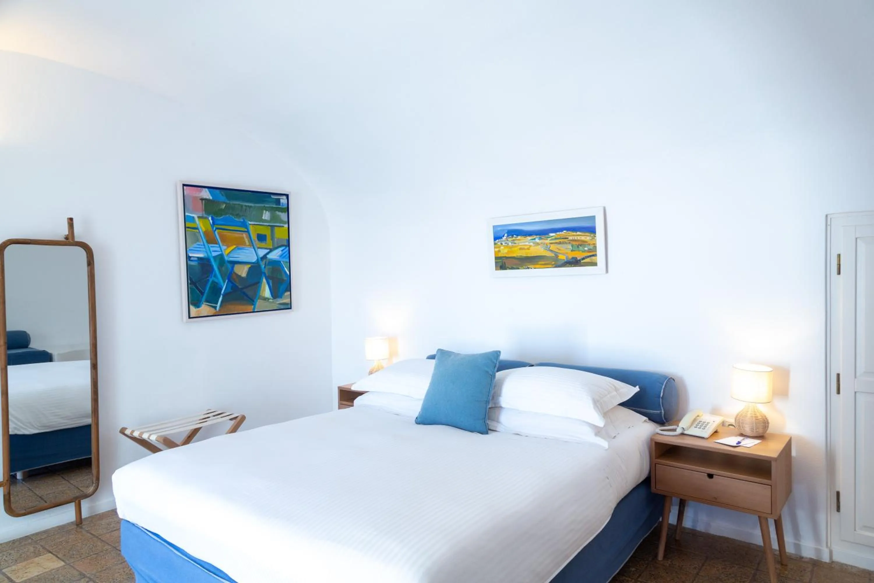 Living room, Bed in Pantelia Suites