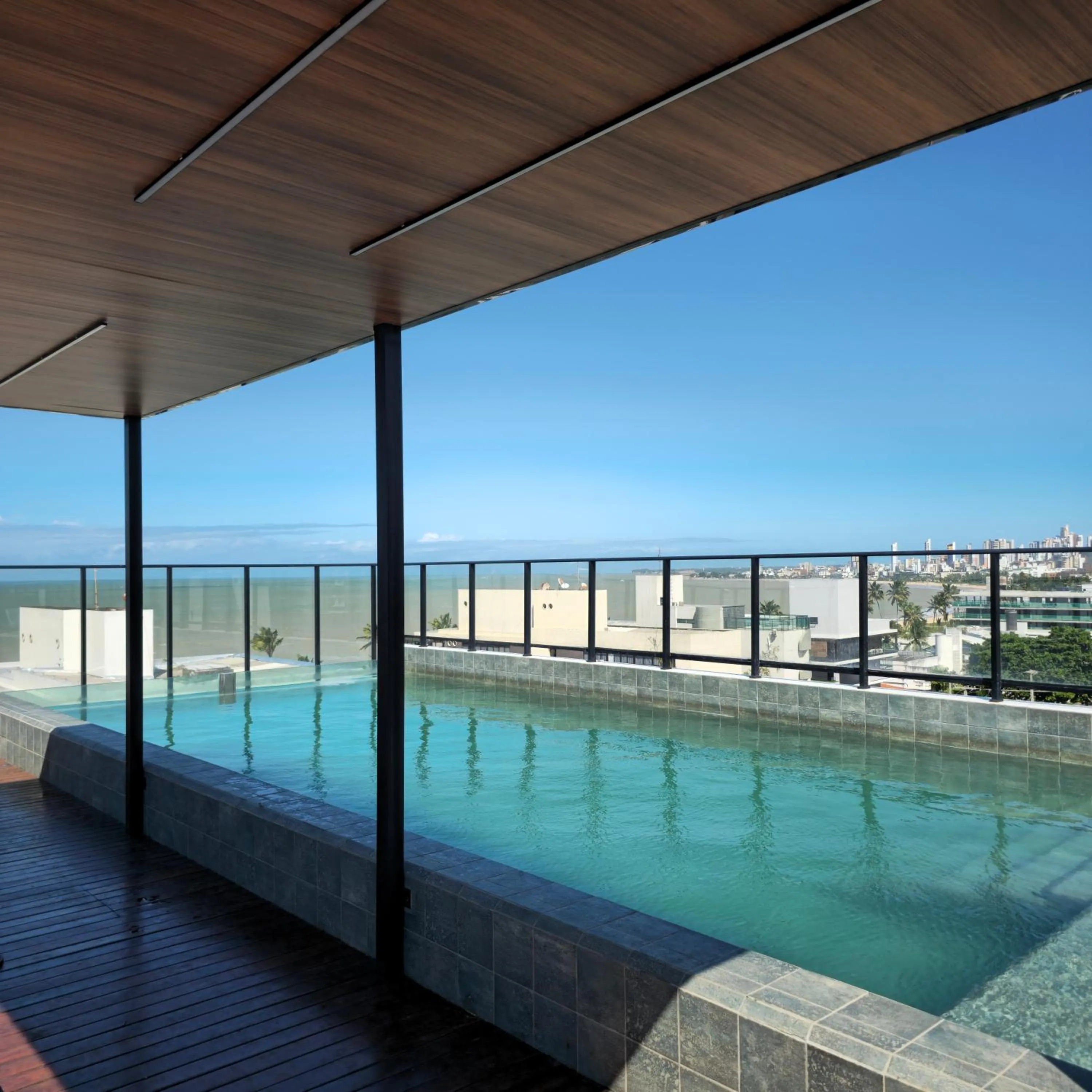 Swimming pool in Lindo Flat no Jardim Oceania - Get One