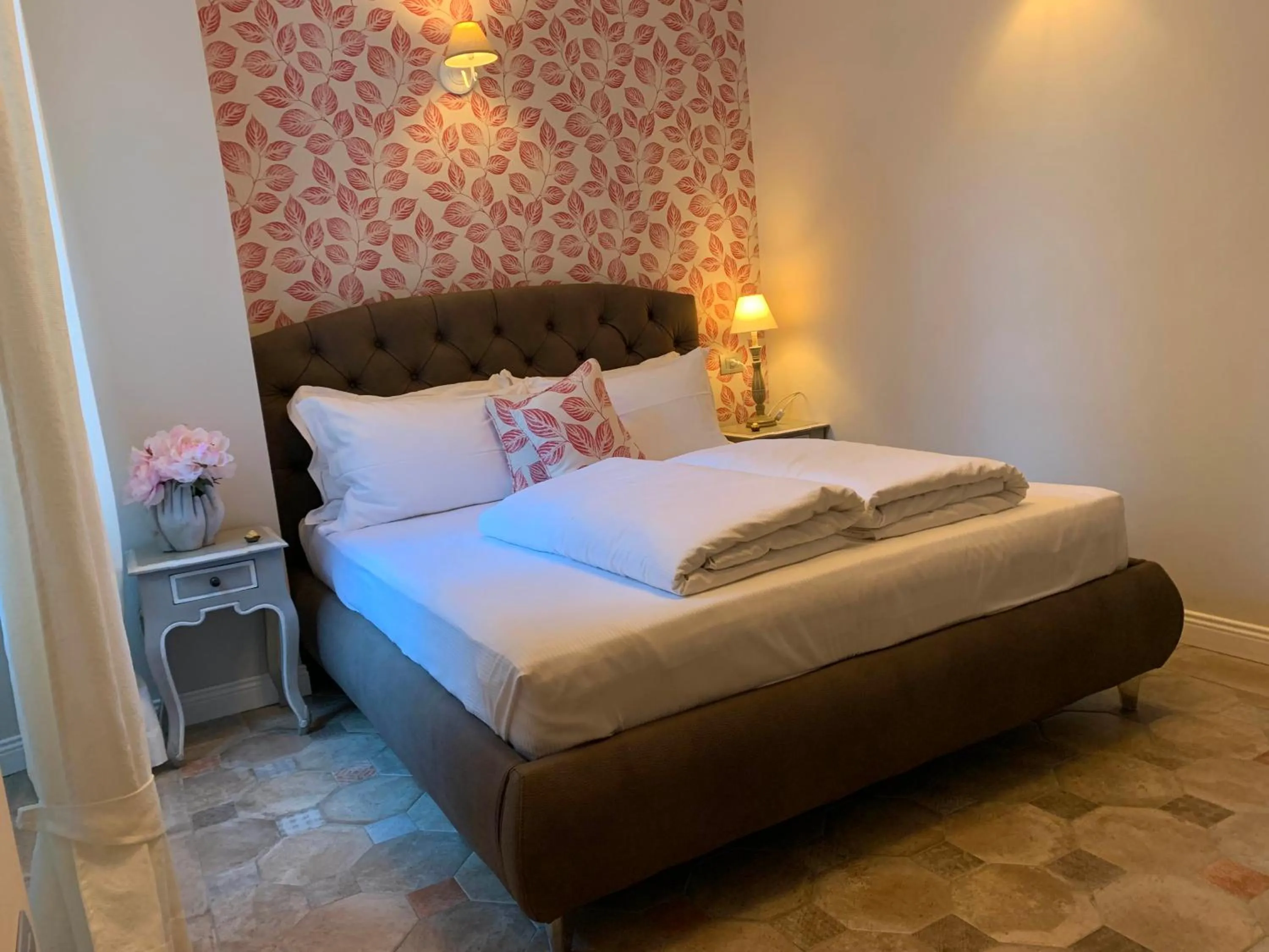 Bed in Spiaggia Amore - Appartamenti Vacanza Vista Lago - Luxury Apartments