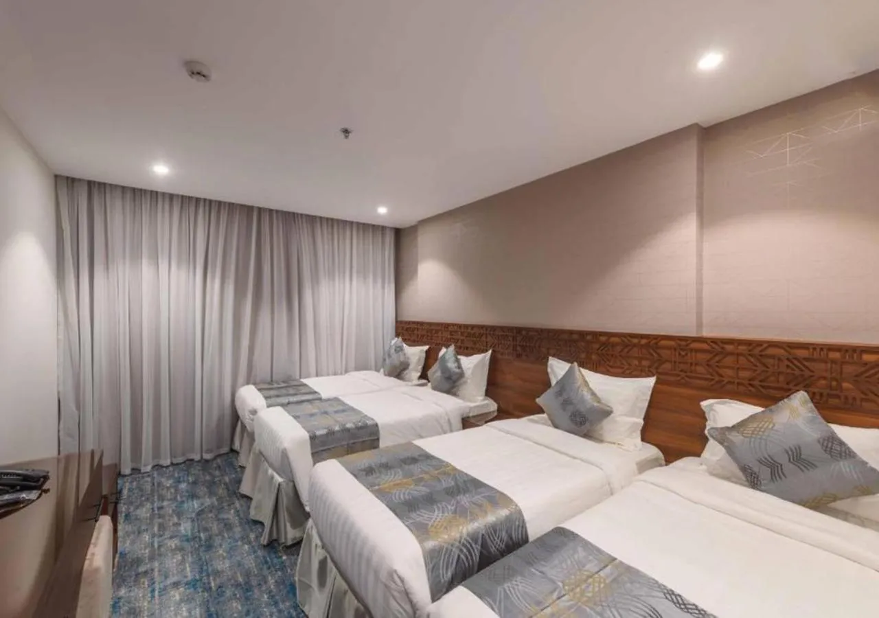 Bed in Manazel Al Zaireen Hotel