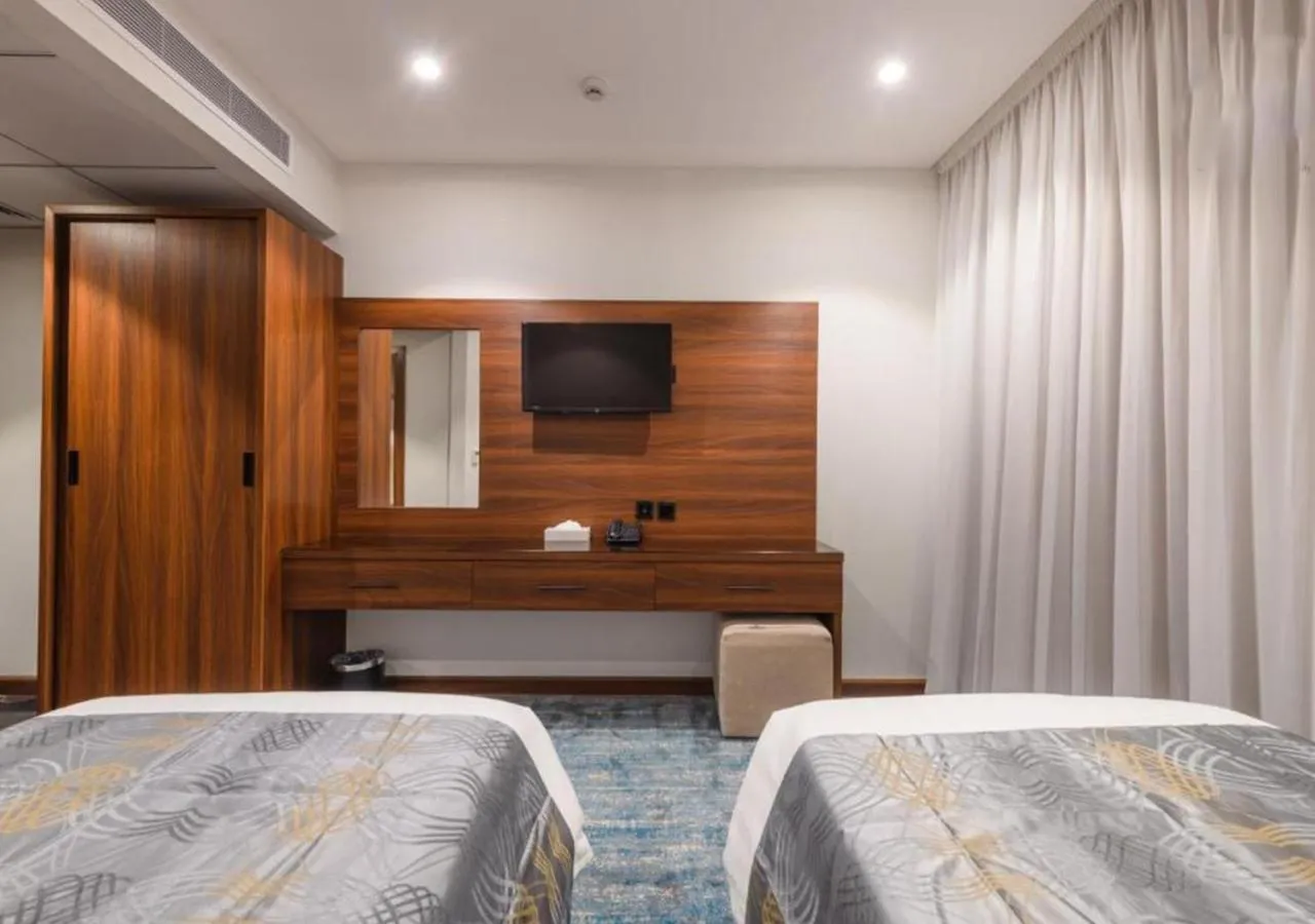 Bed in Manazel Al Zaireen Hotel