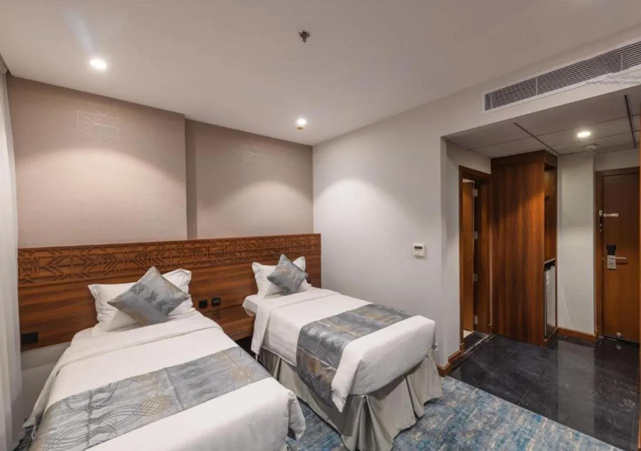 Bed in Manazel Al Zaireen Hotel