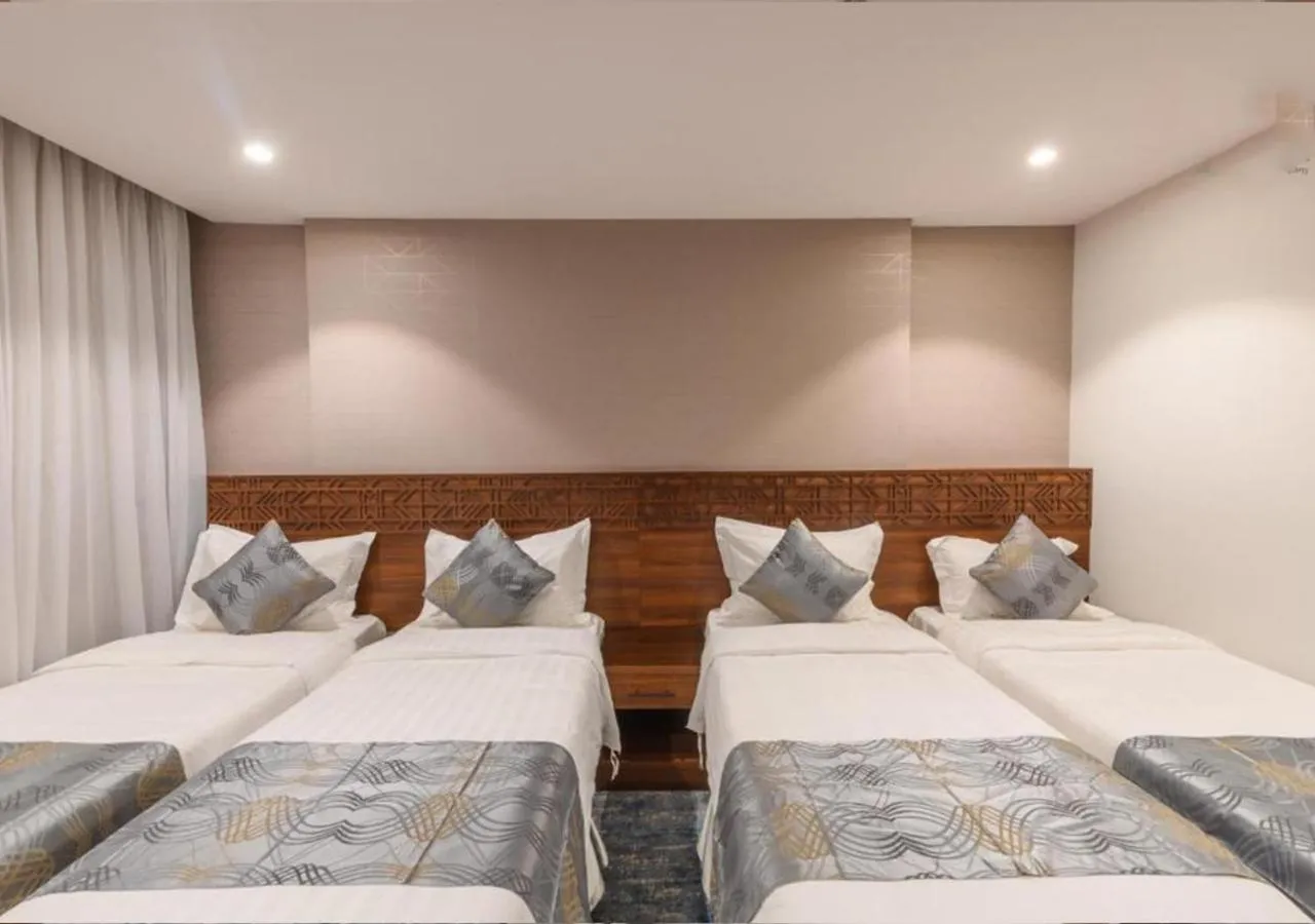 Bed in Manazel Al Zaireen Hotel