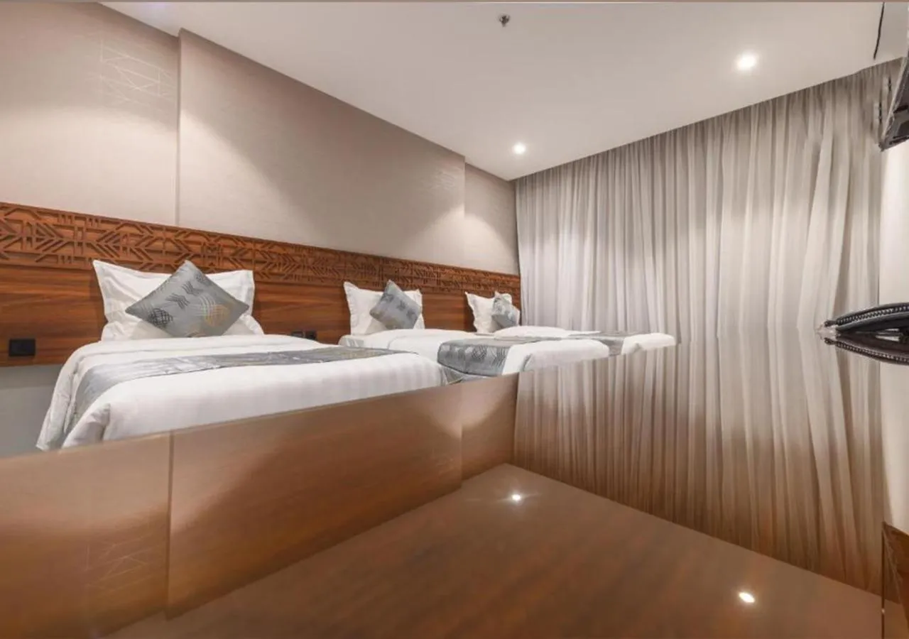 Bed in Manazel Al Zaireen Hotel