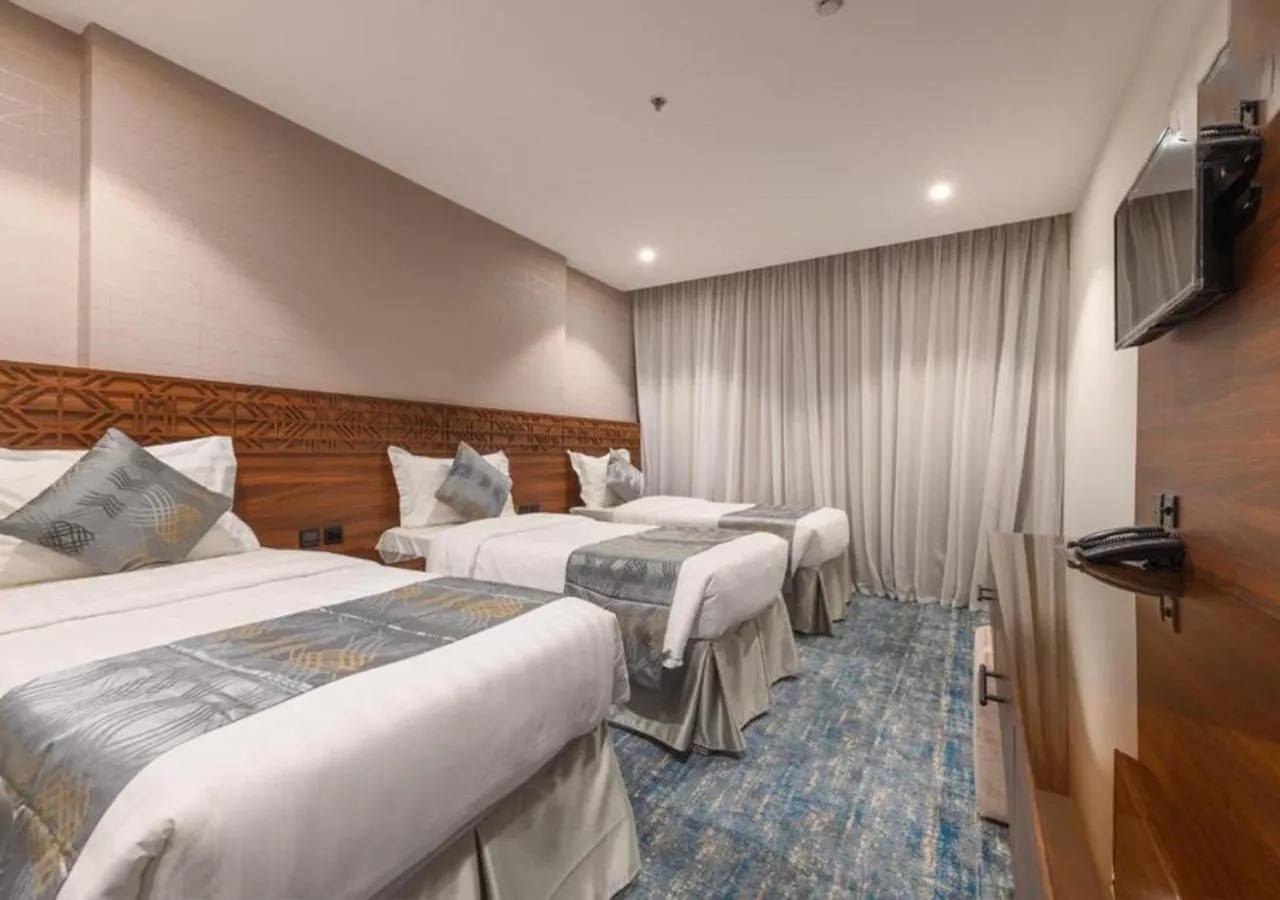 Bed in Manazel Al Zaireen Hotel