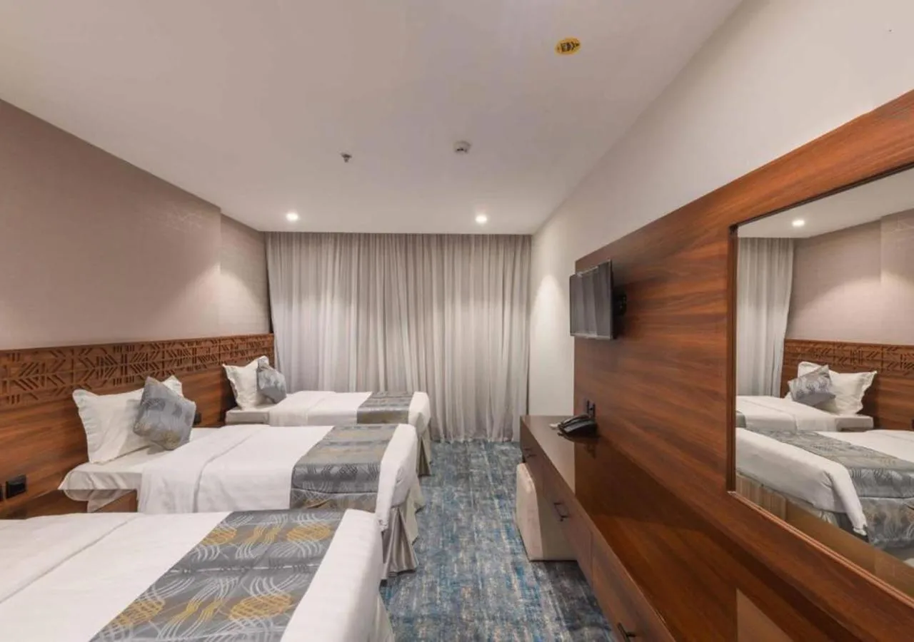Bed in Manazel Al Zaireen Hotel