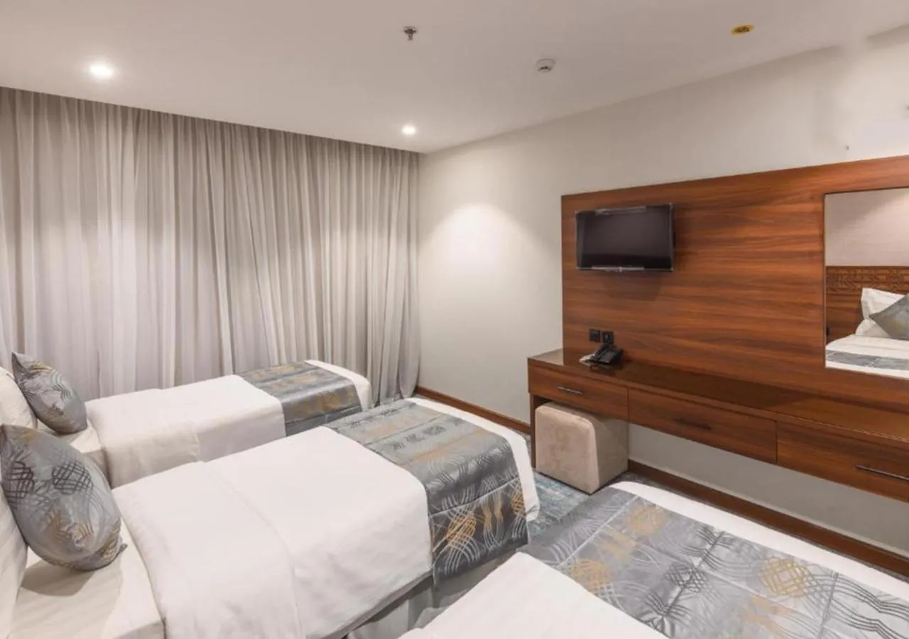 Bed in Manazel Al Zaireen Hotel