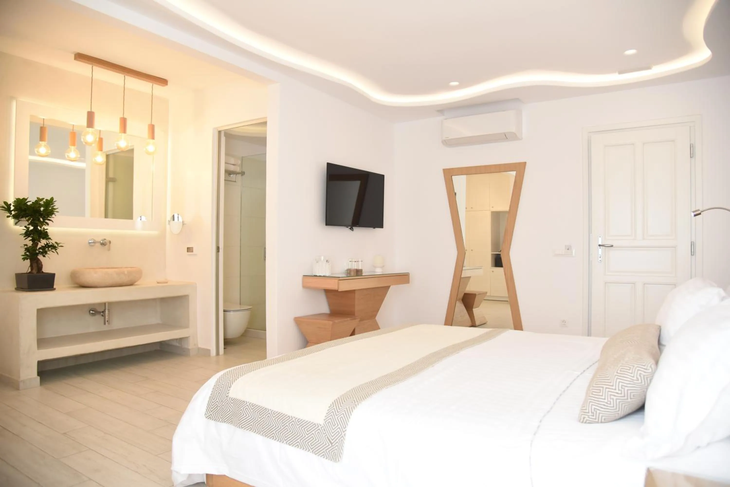 Bed in Damianos Mykonos Hotel