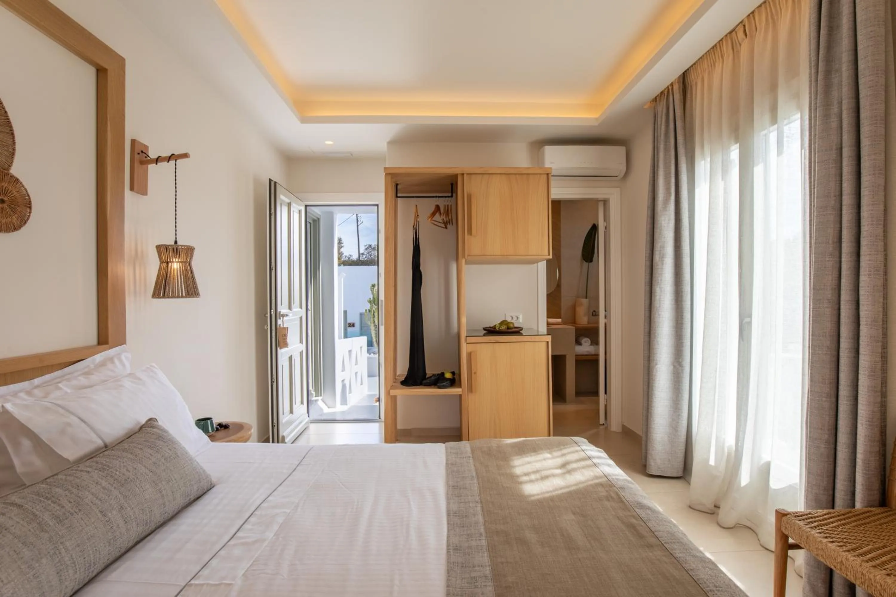 Bed in Damianos Mykonos Hotel