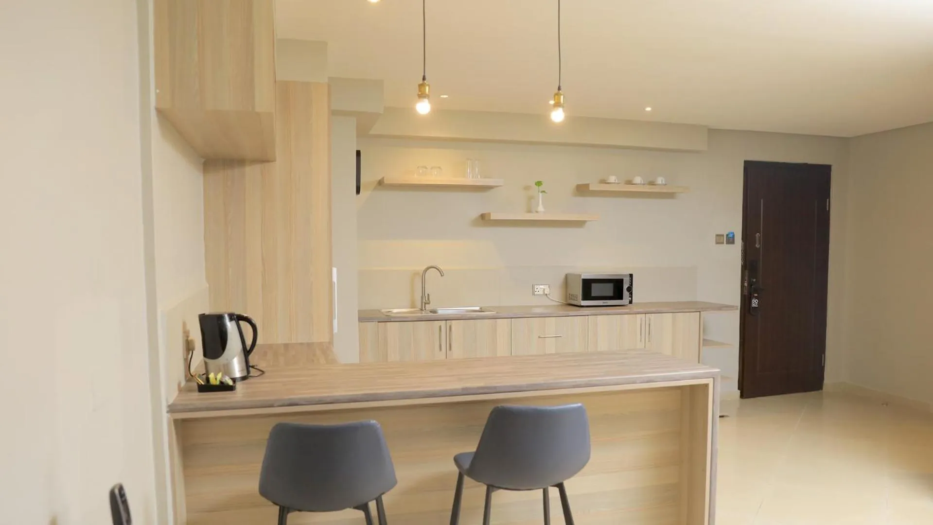 Kitchen or kitchenette in Meilin International Hotel