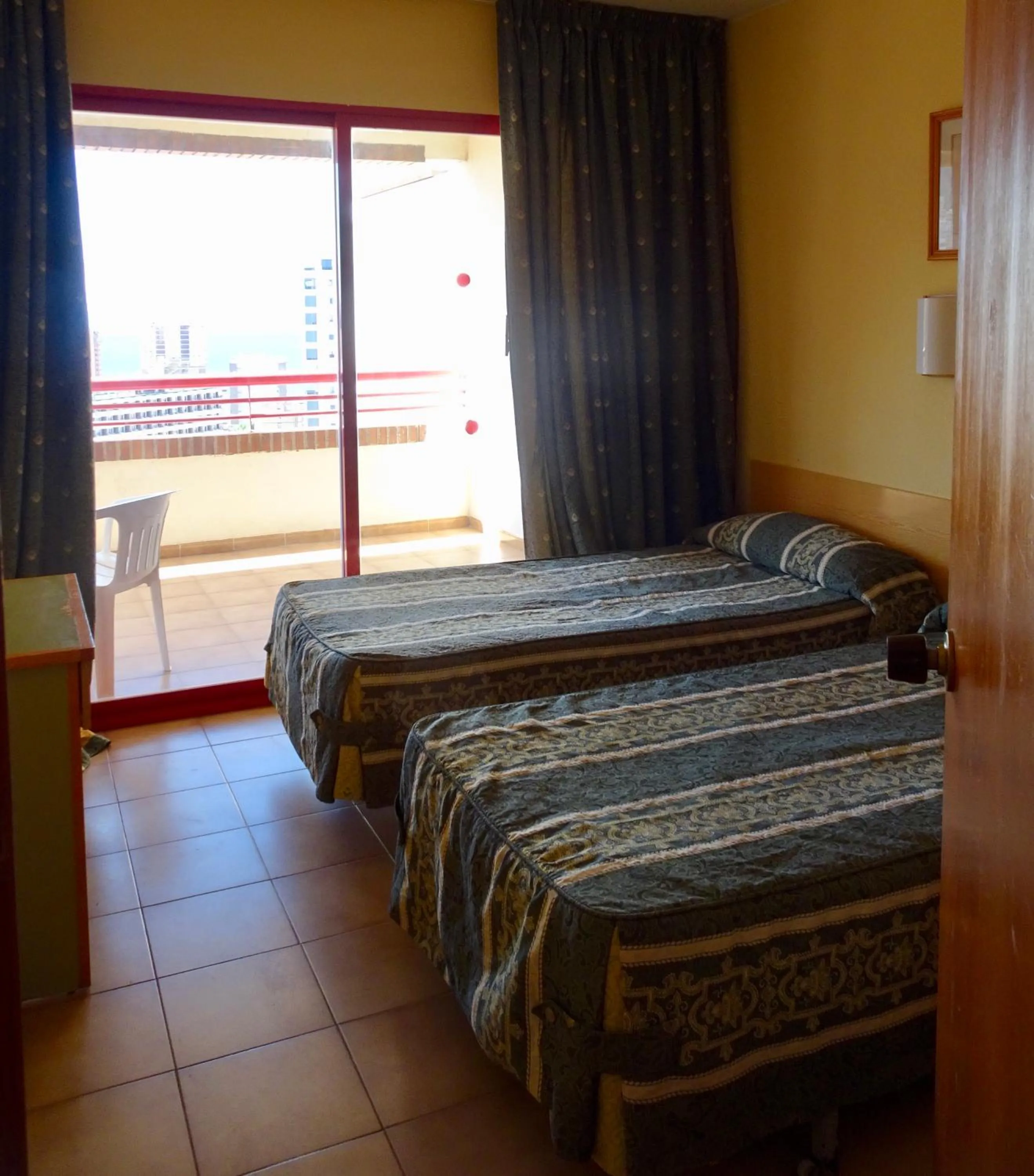 Bed in Evamar Apartments