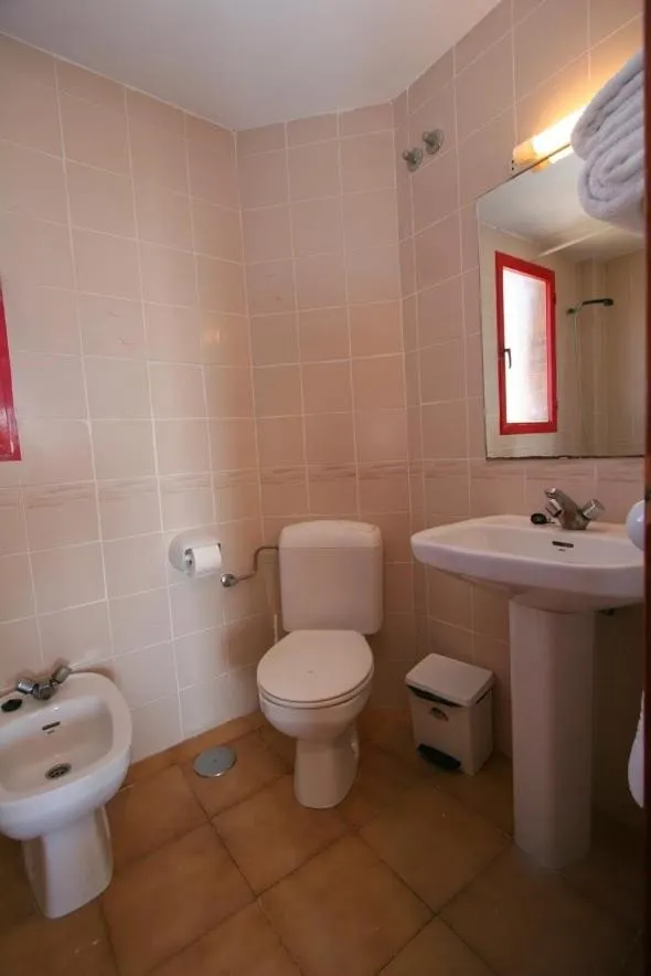 Toilet in Evamar Apartments
