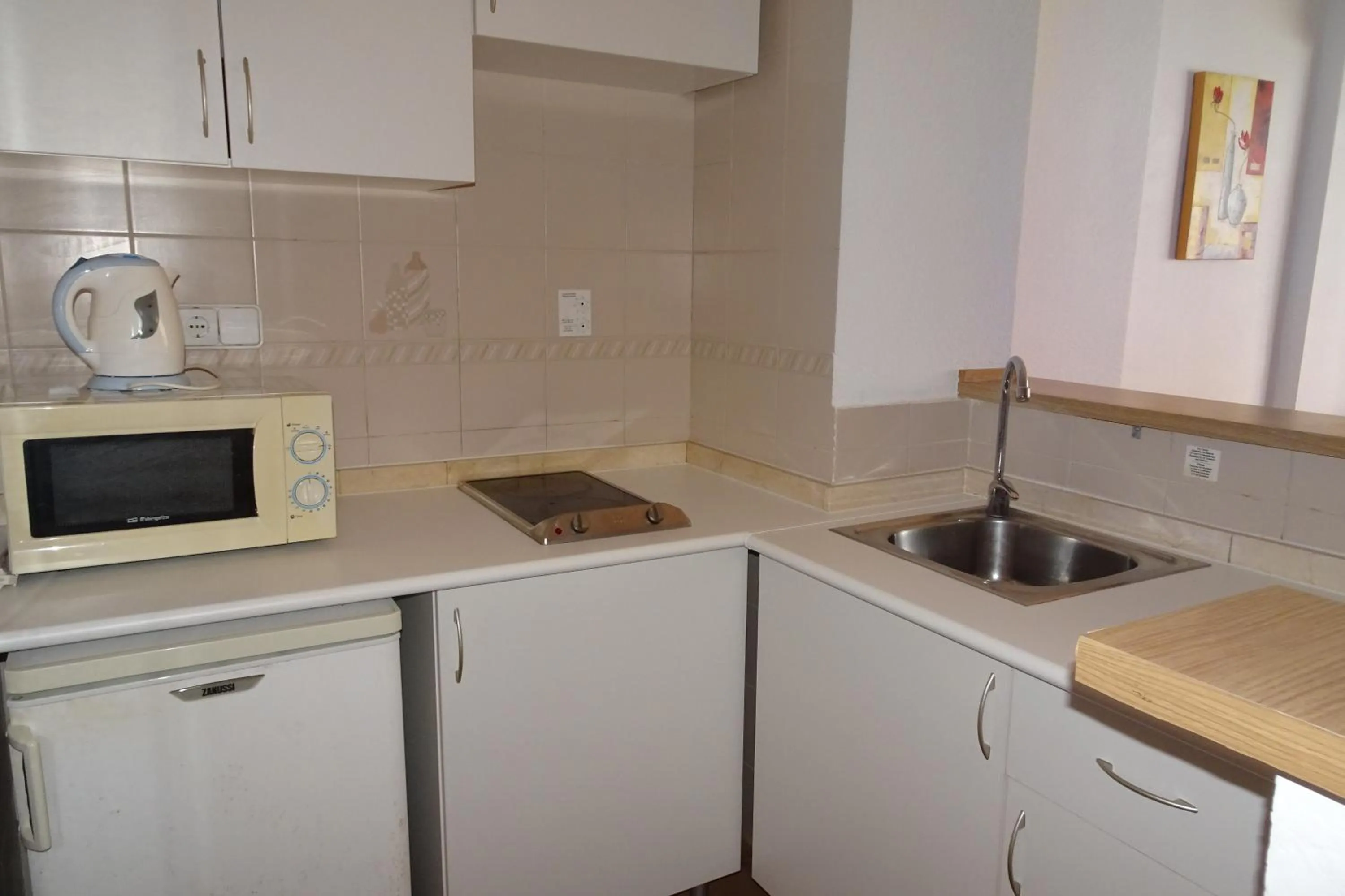 Kitchen or kitchenette in Evamar Apartments