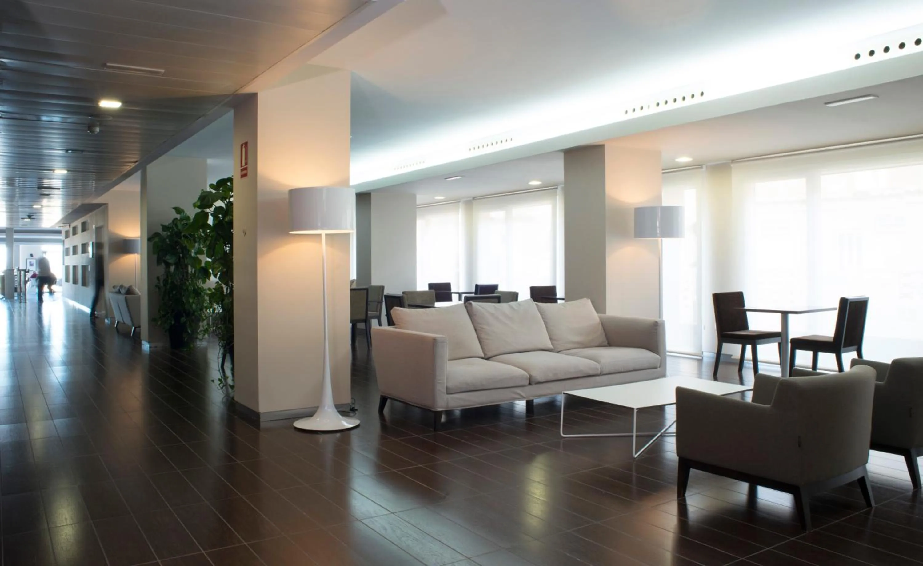 Communal lounge/ TV room in Aparthotel Acualandia