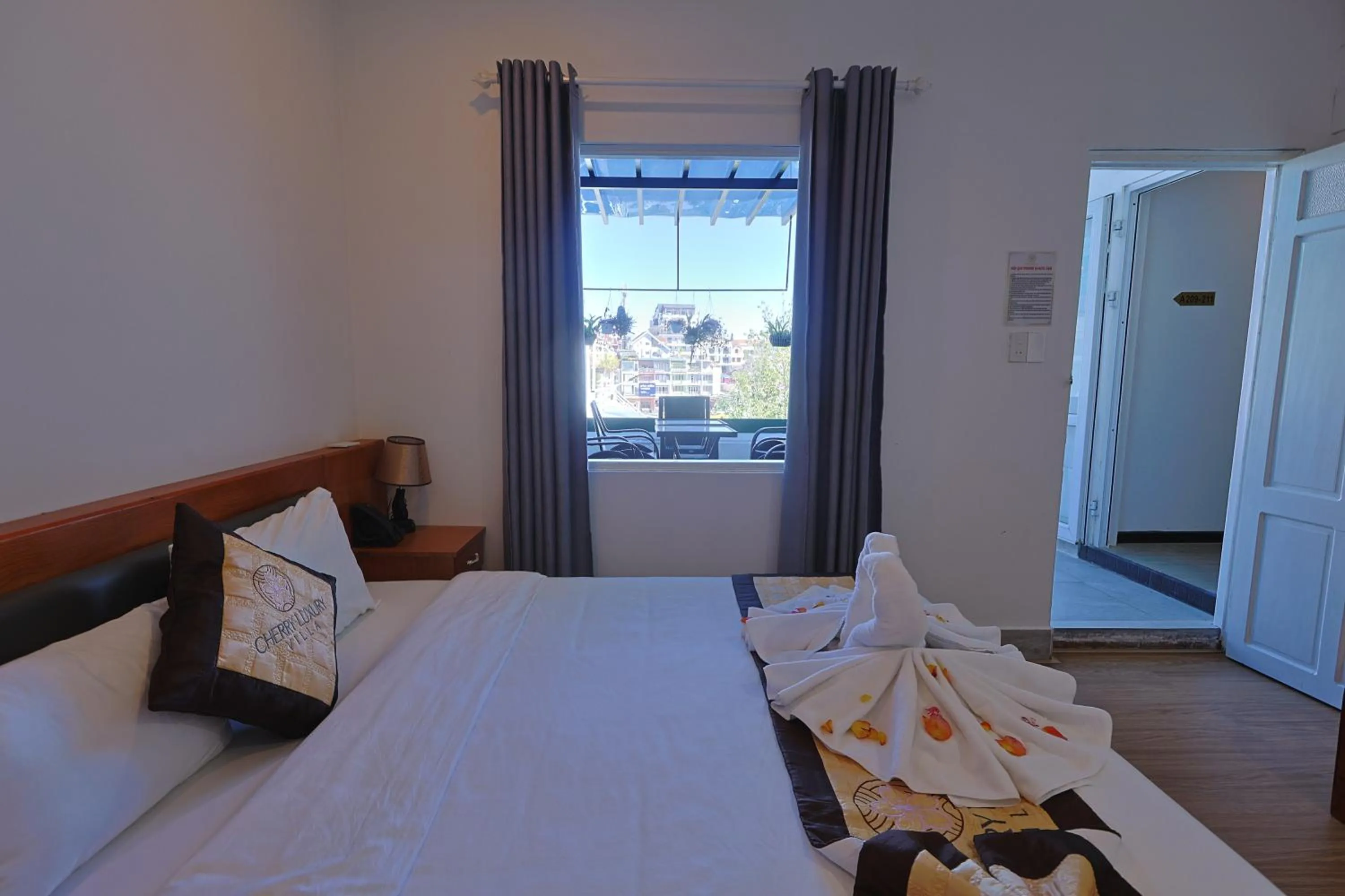 Bed in Cherry Luxury Hotel