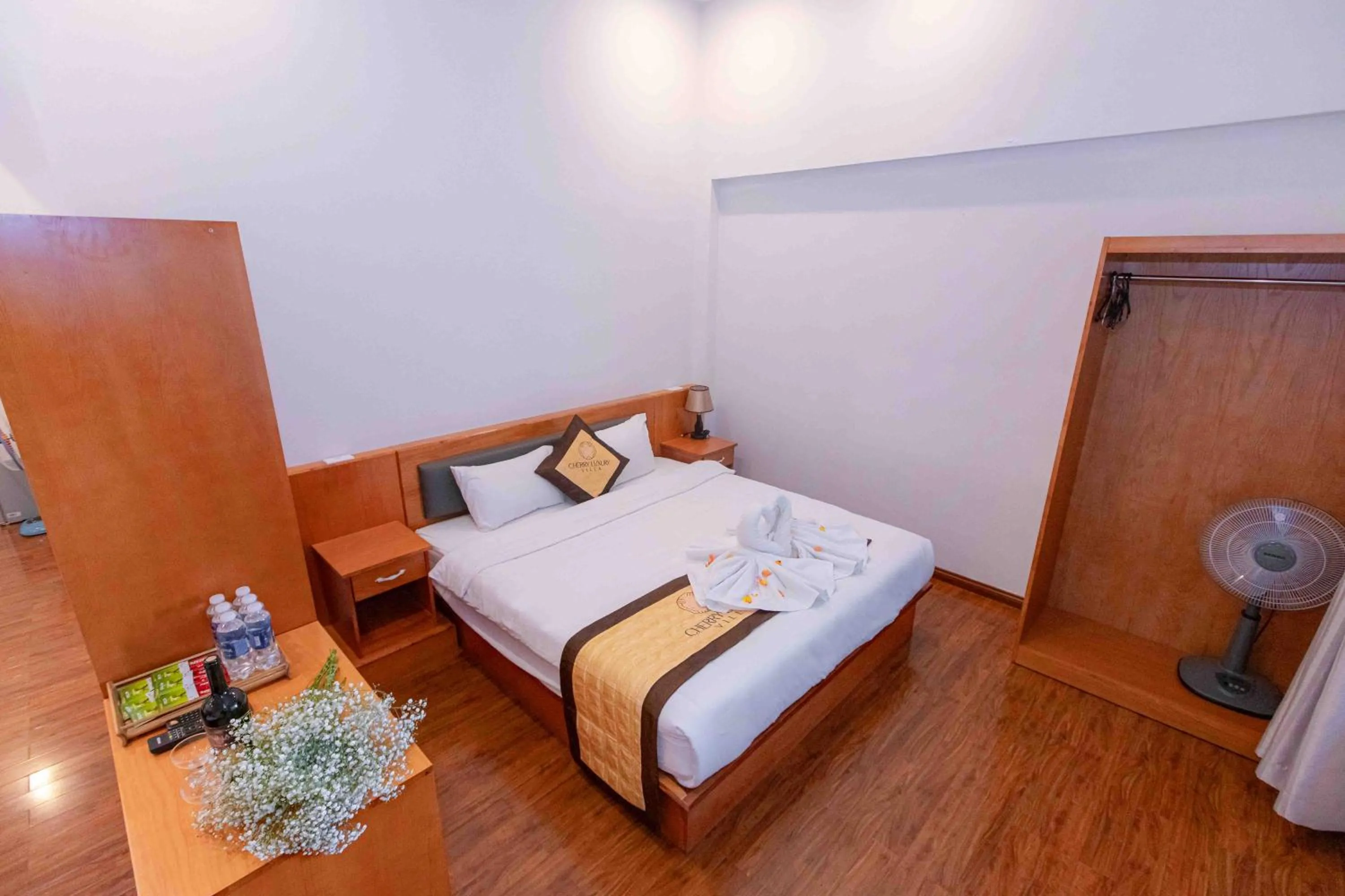 Bed in Cherry Luxury Hotel