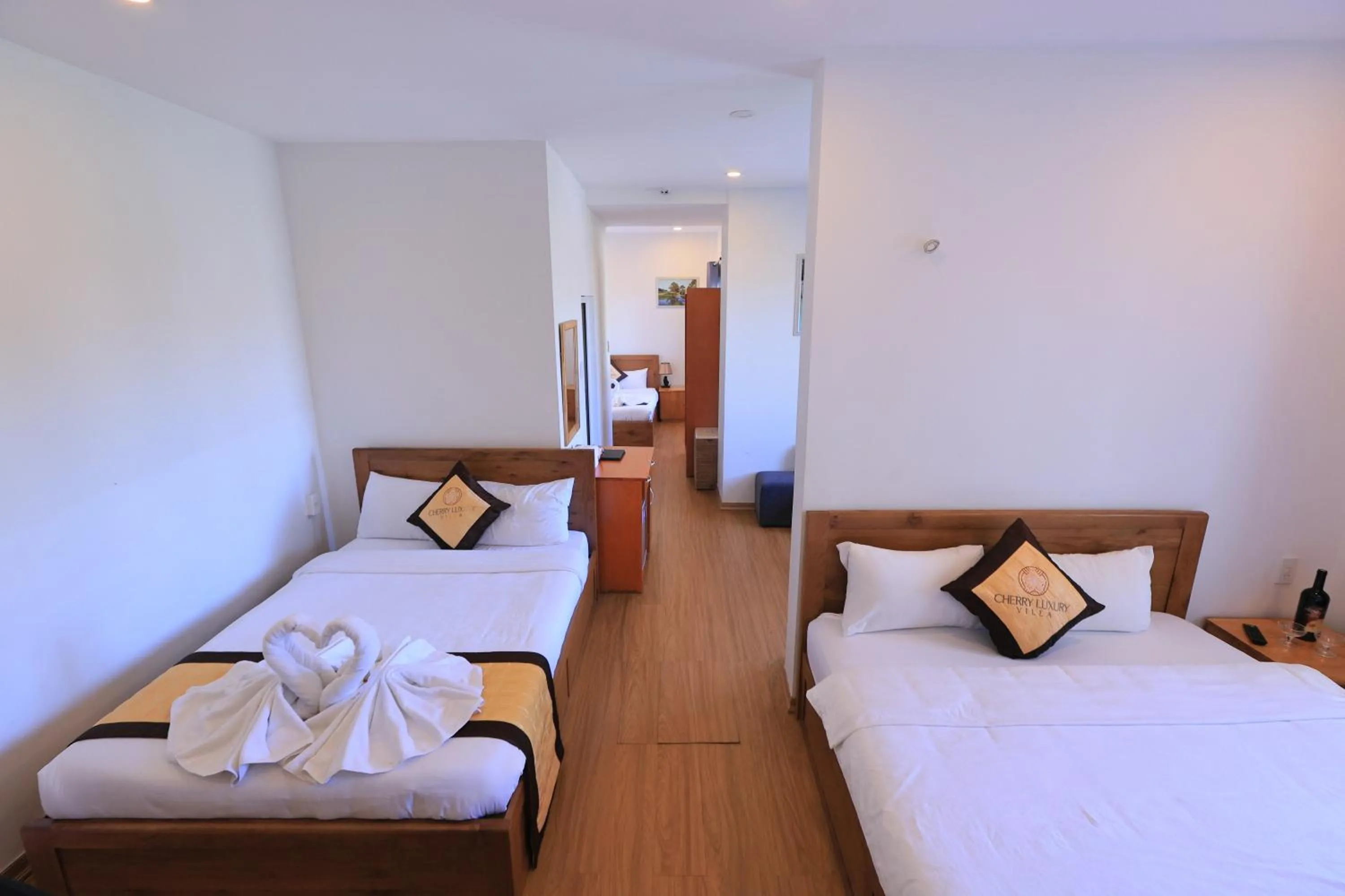 Bed in Cherry Luxury Hotel