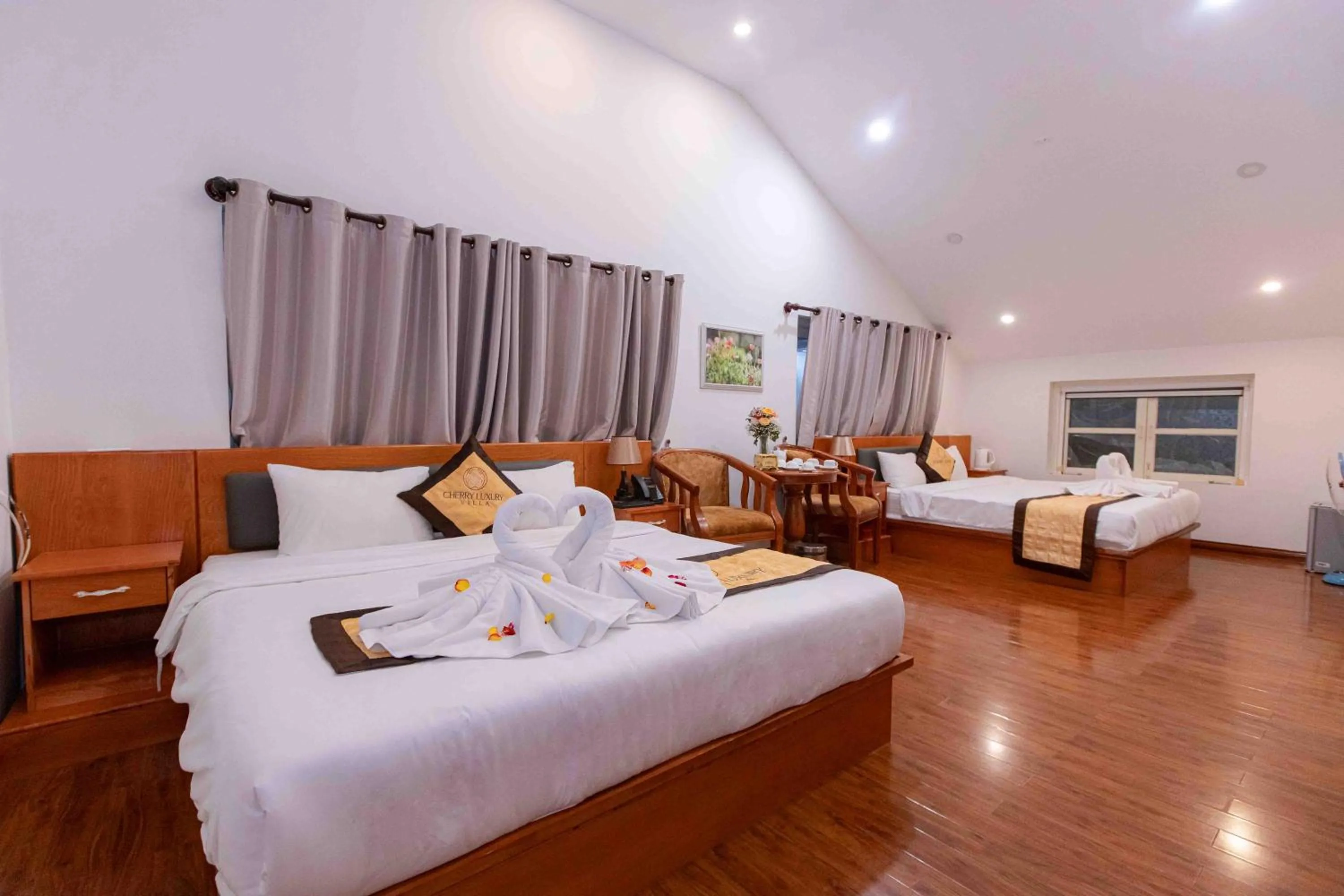 Bed in Cherry Luxury Hotel