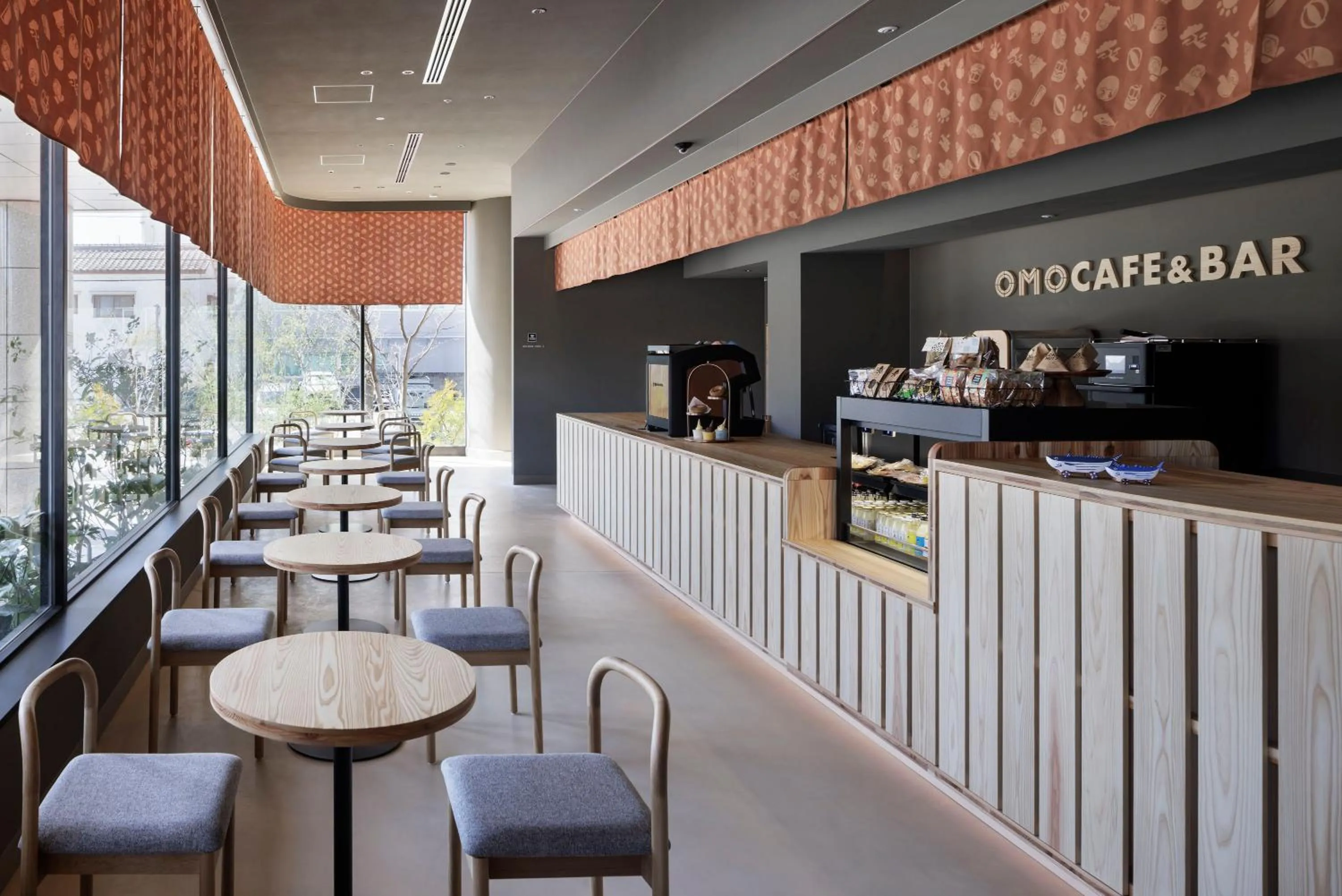 Lounge or bar in OMO7 Kochi by Hoshino Resorts