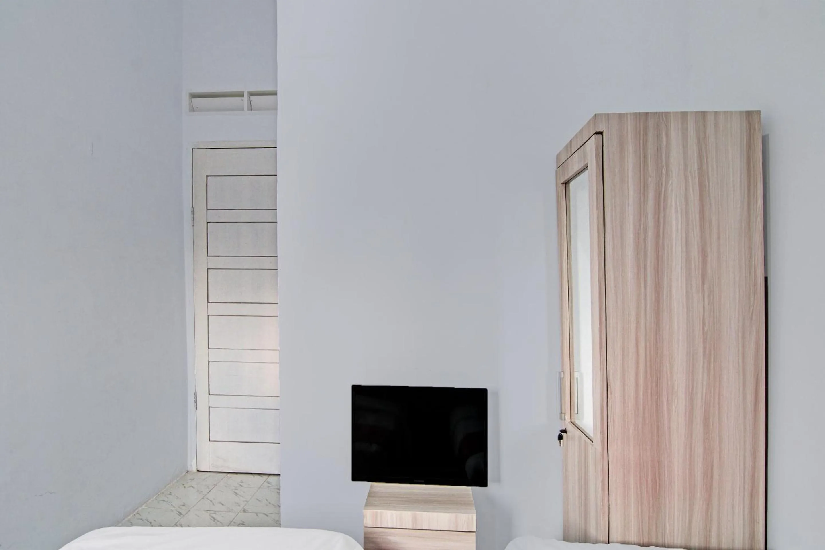 Bedroom in Hotel O Melati Residence Syariah