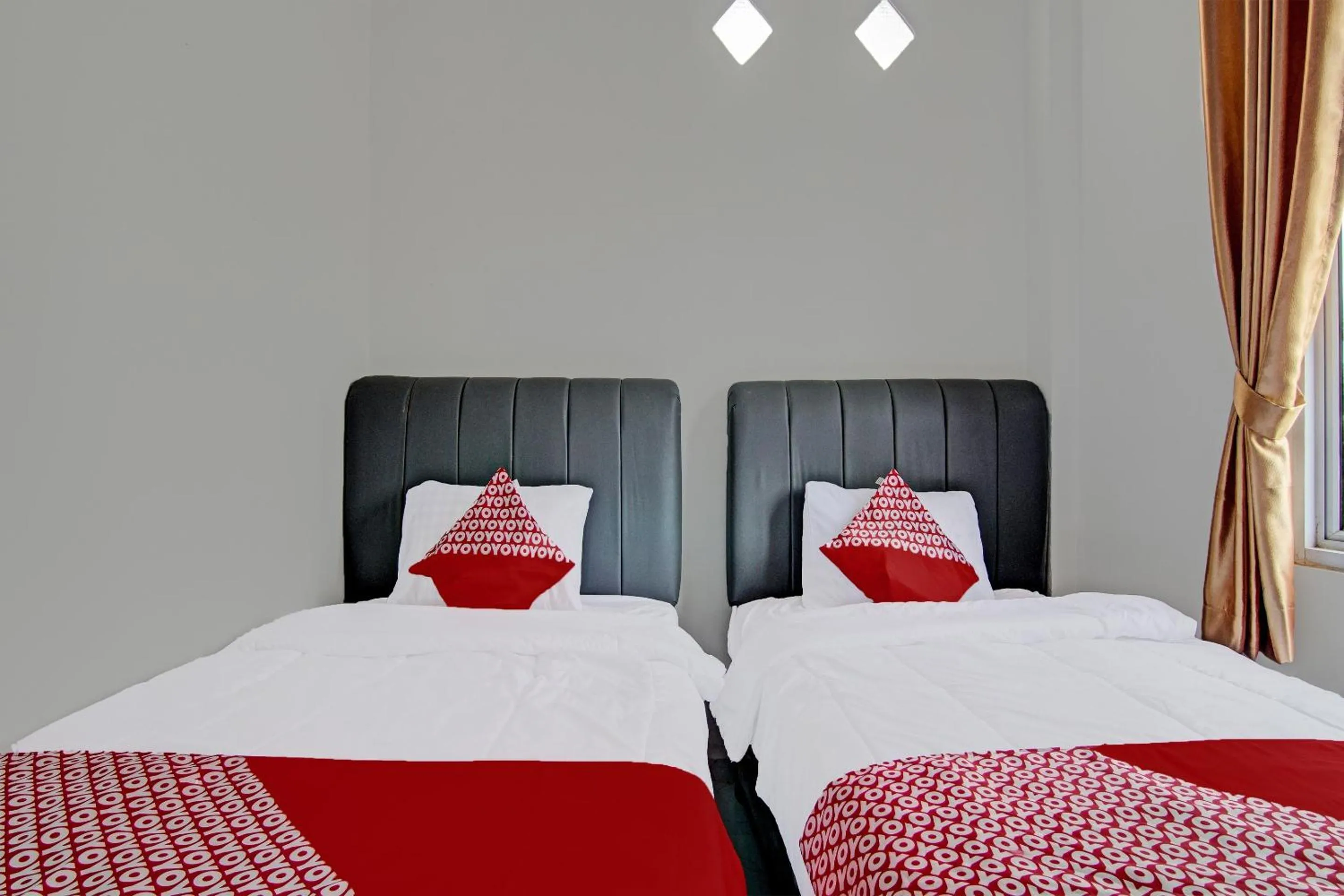 Bedroom in Hotel O Melati Residence Syariah