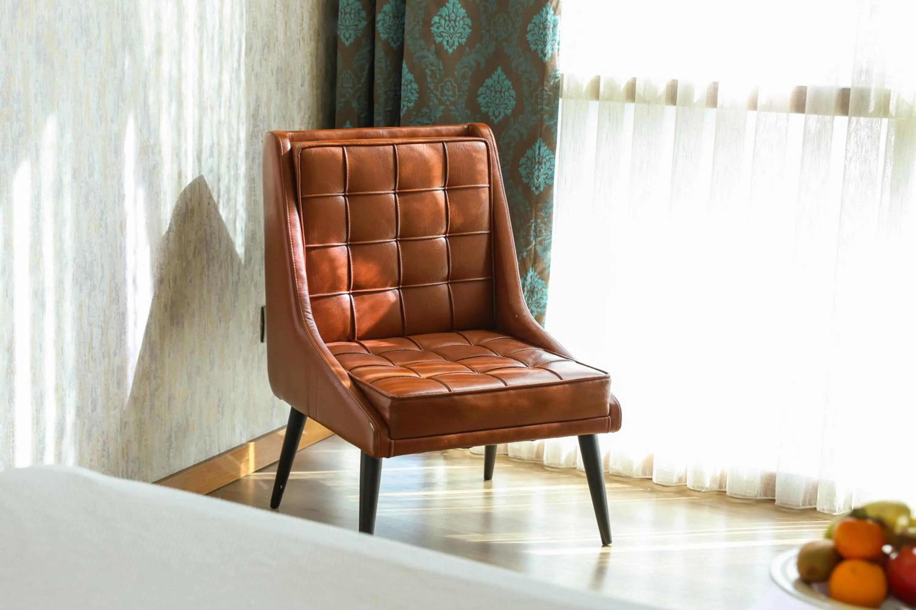 Seating area in The Hera Platinum Hotel