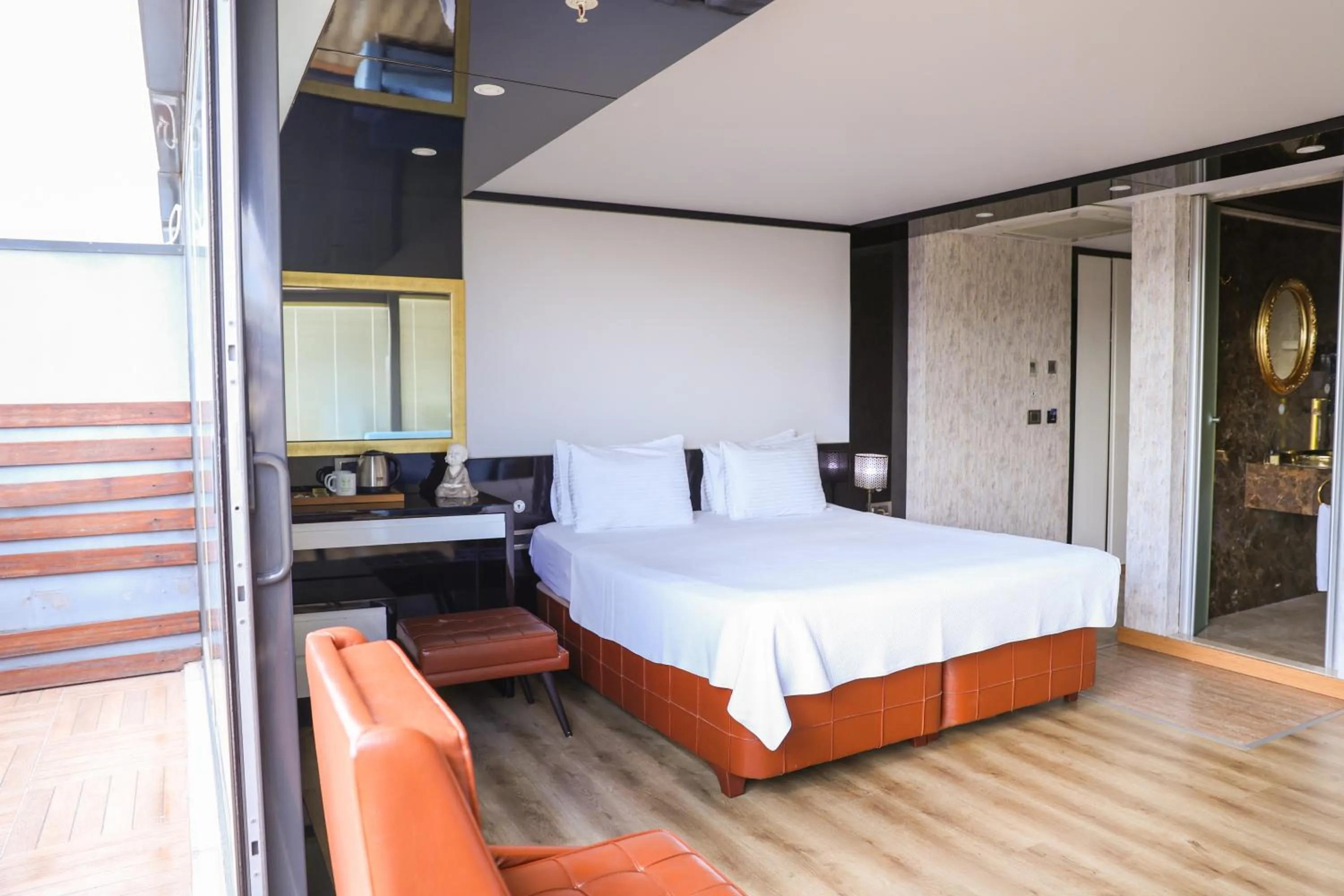 Bed in The Hera Platinum Hotel