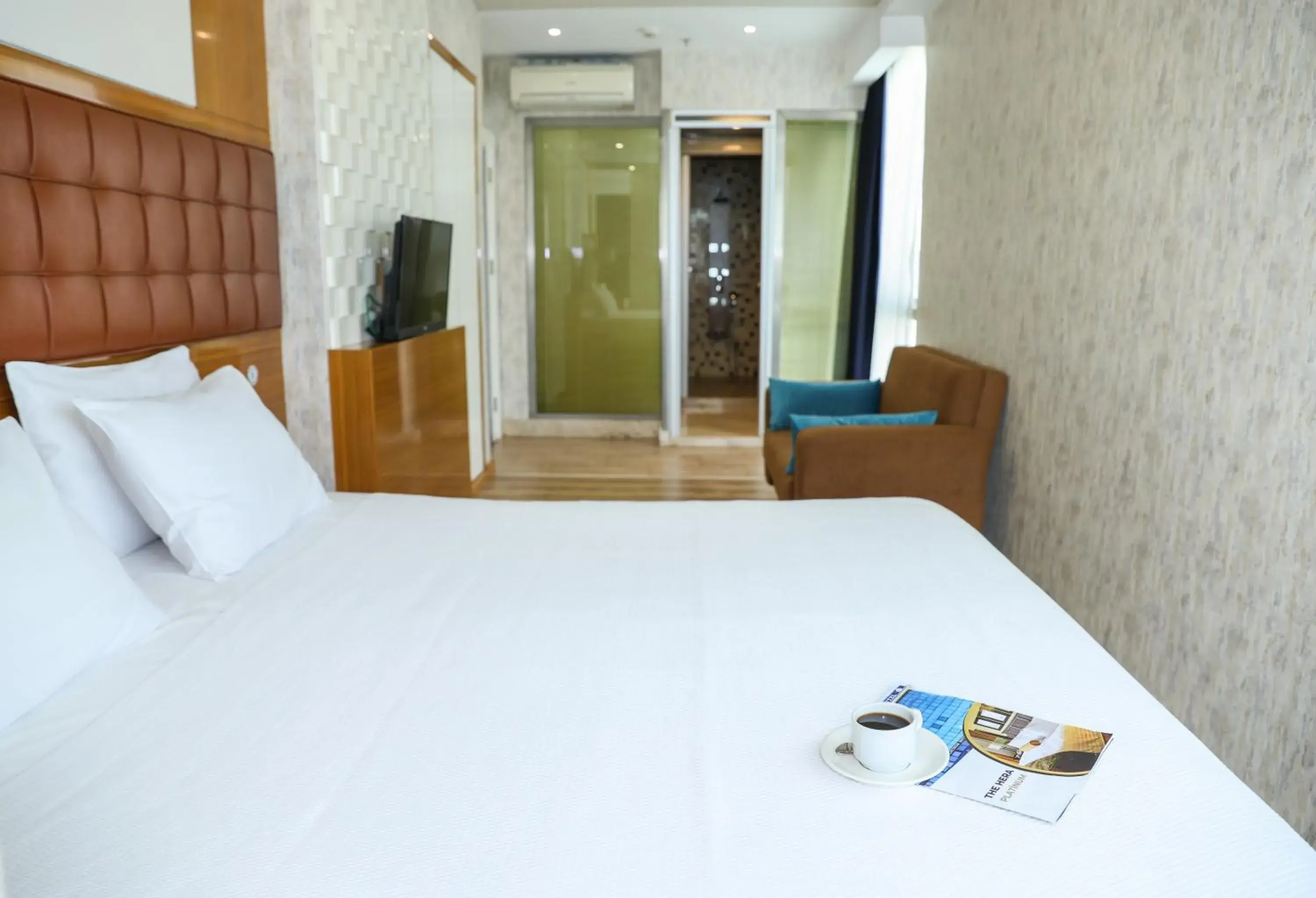 Bed in The Hera Platinum Hotel Bed in The Hera Platinum Hotel