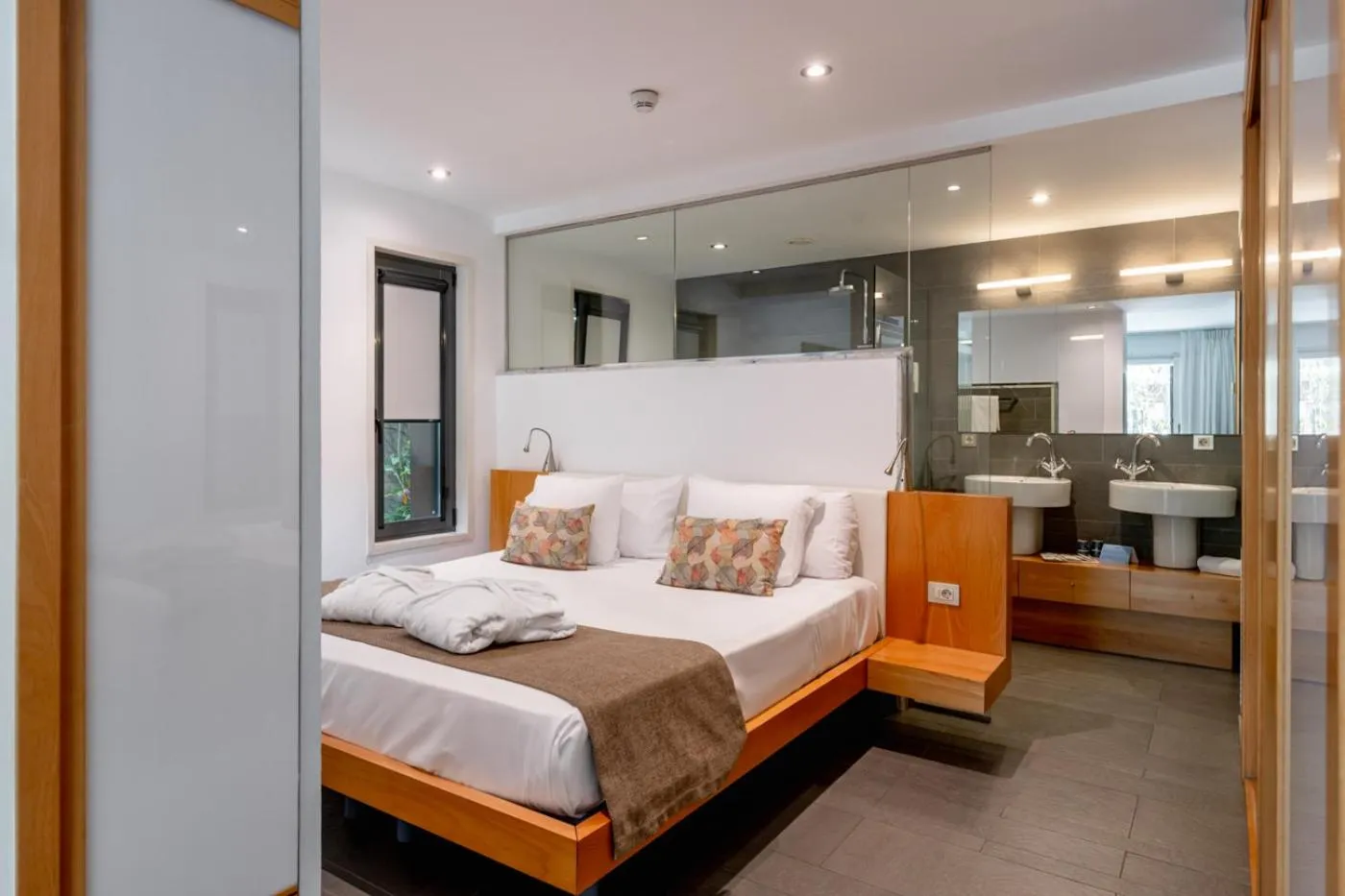 Bed in NM Suites by Escampa Hotels