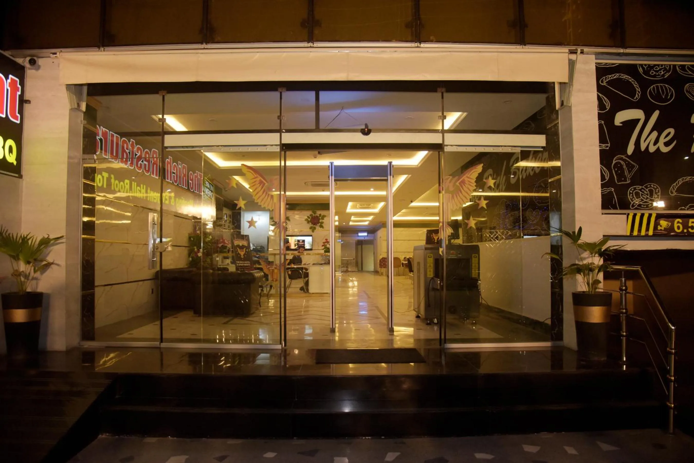 Property building in The Rich Hotel & Apartments