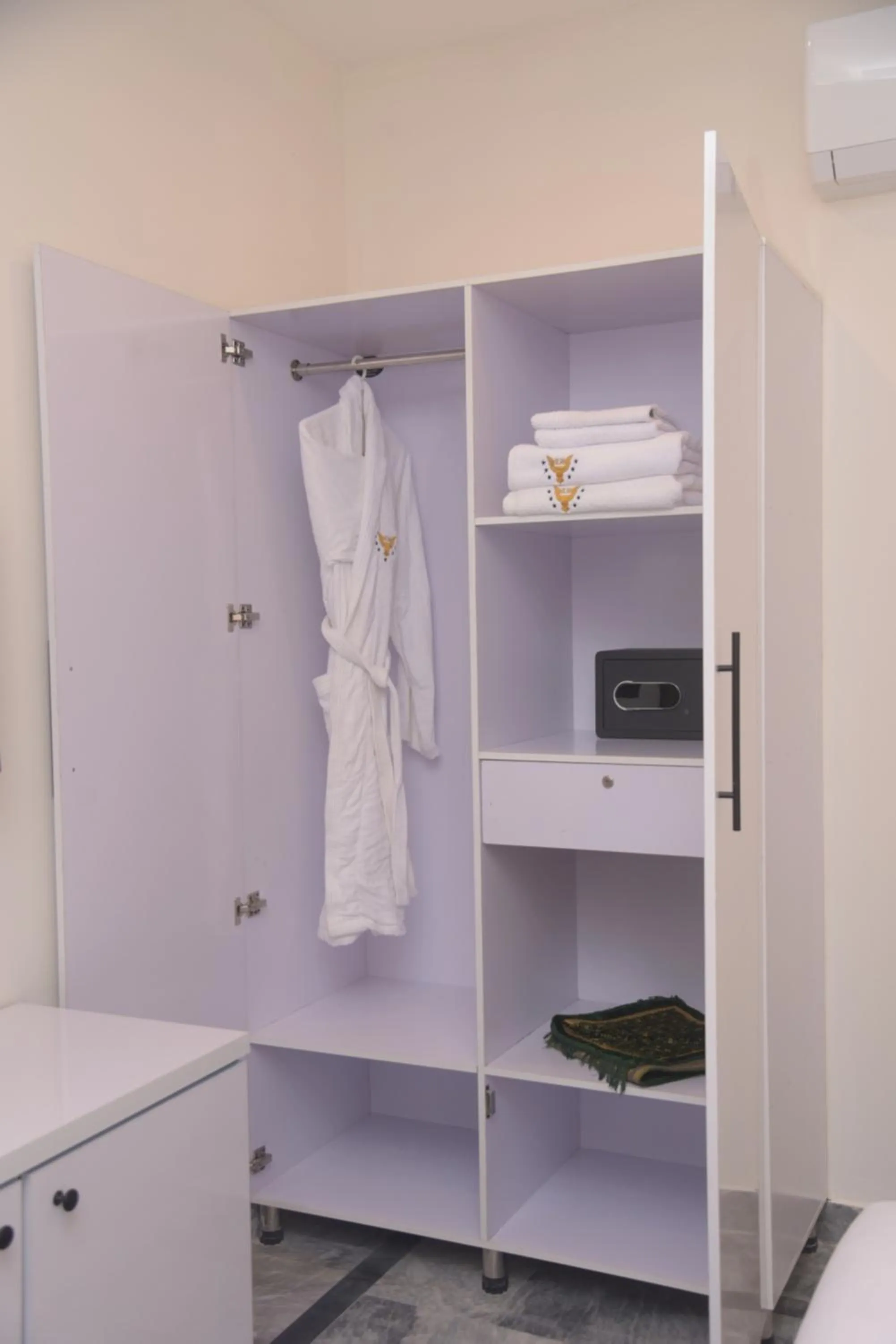 towels in The Rich Hotel & Apartments