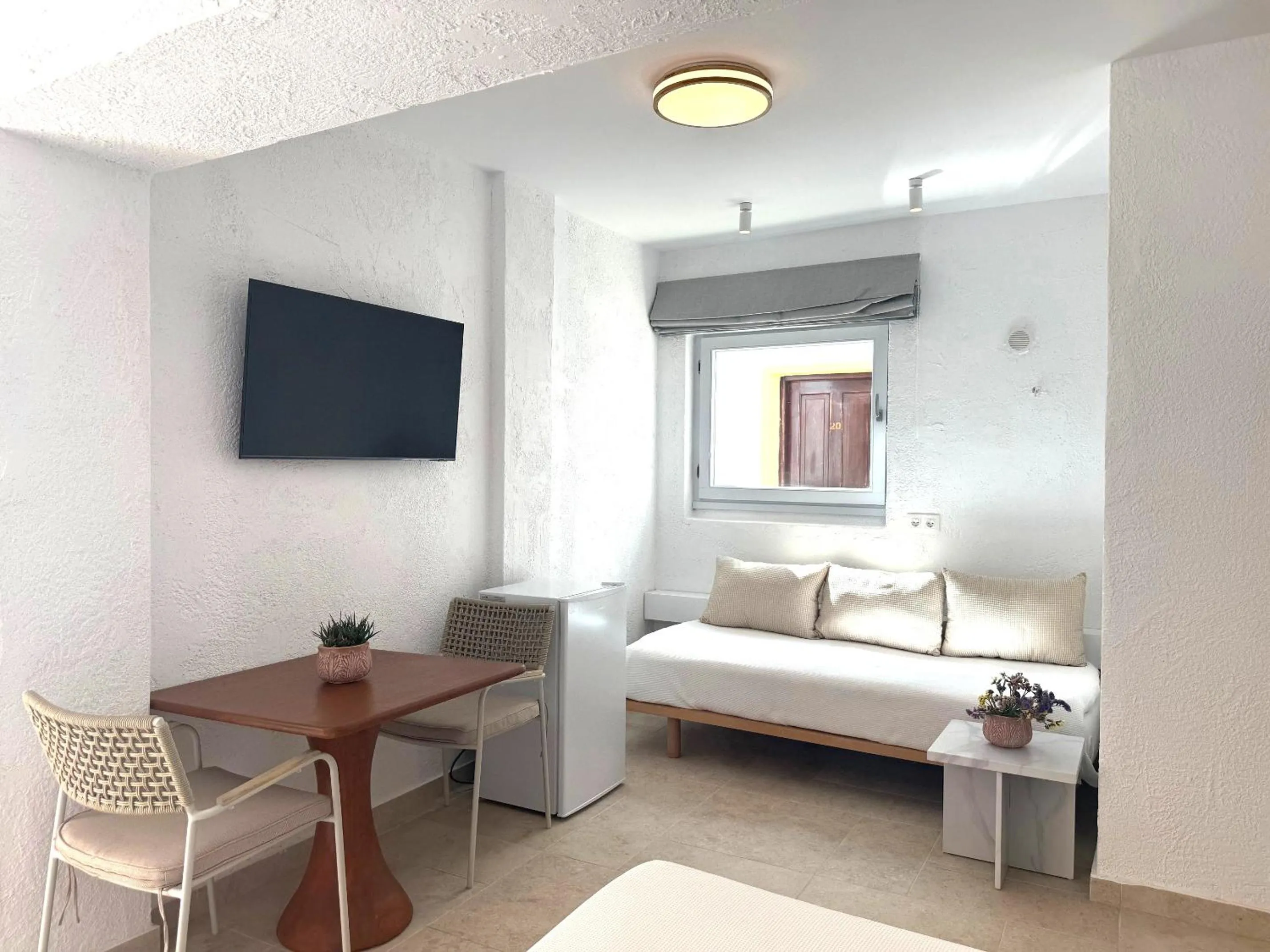 Living room, Bed in Golden Sun Hotel Patmos