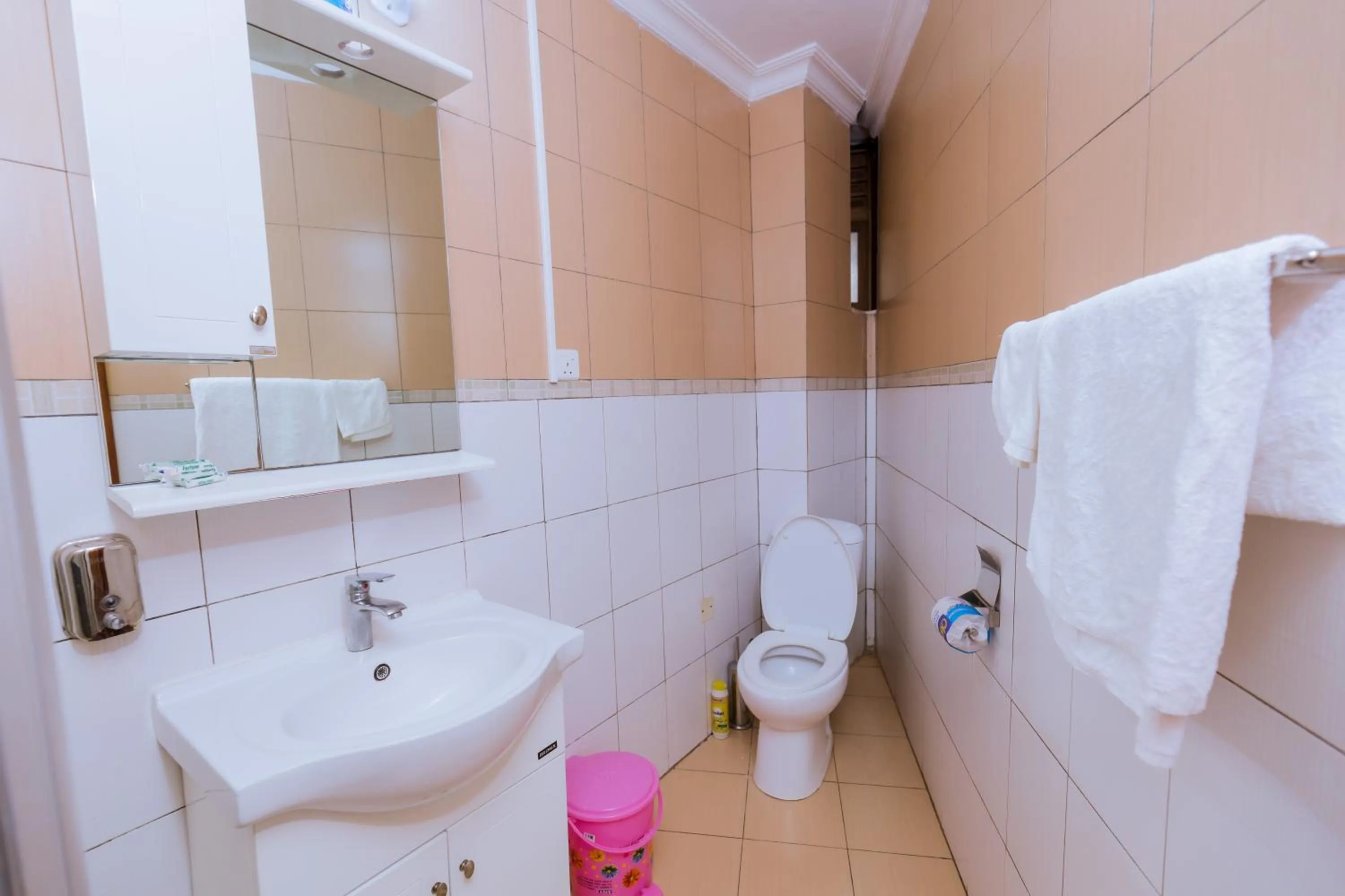 Toilet in KAMI LUXURY APARTMENTS