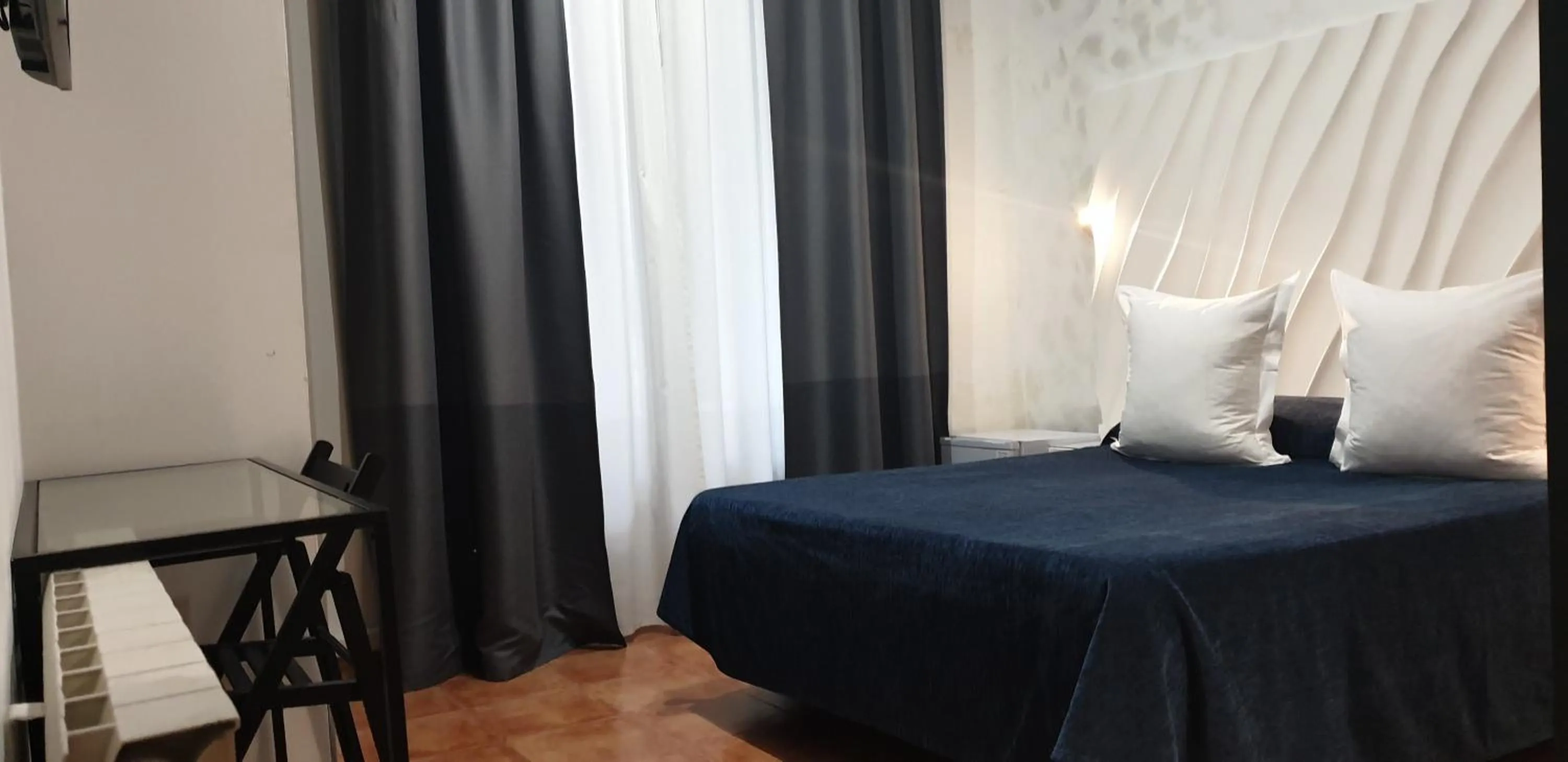 Bed in Hostal Las Fuentes