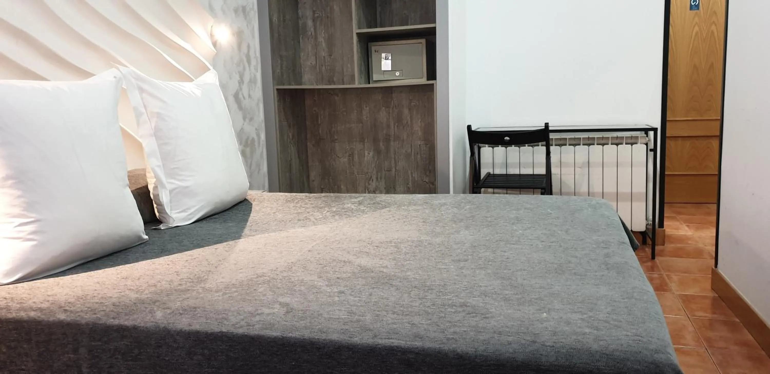 Bed in Hostal Las Fuentes