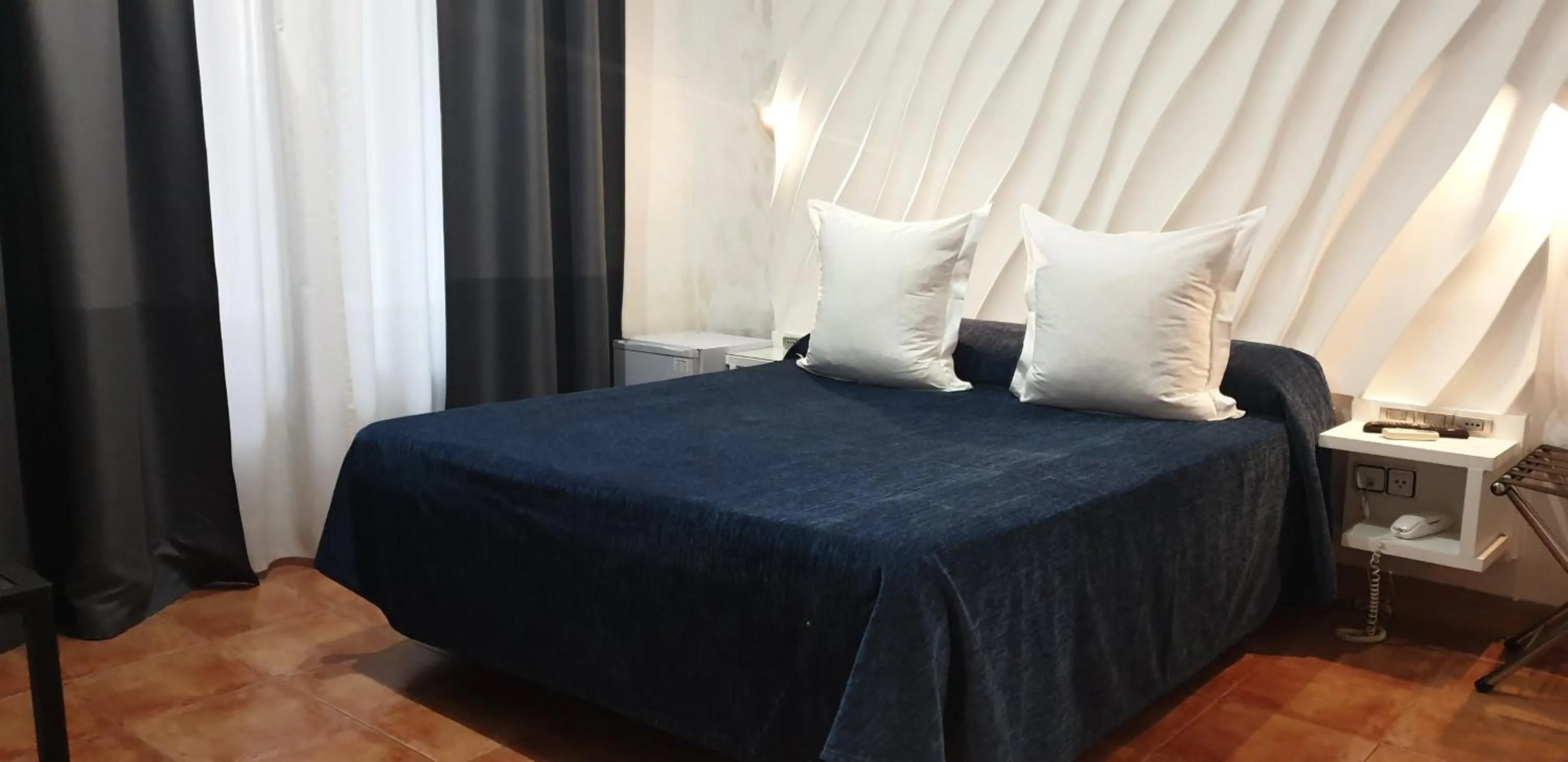 Photo of the whole room, Bed in Hostal Las Fuentes