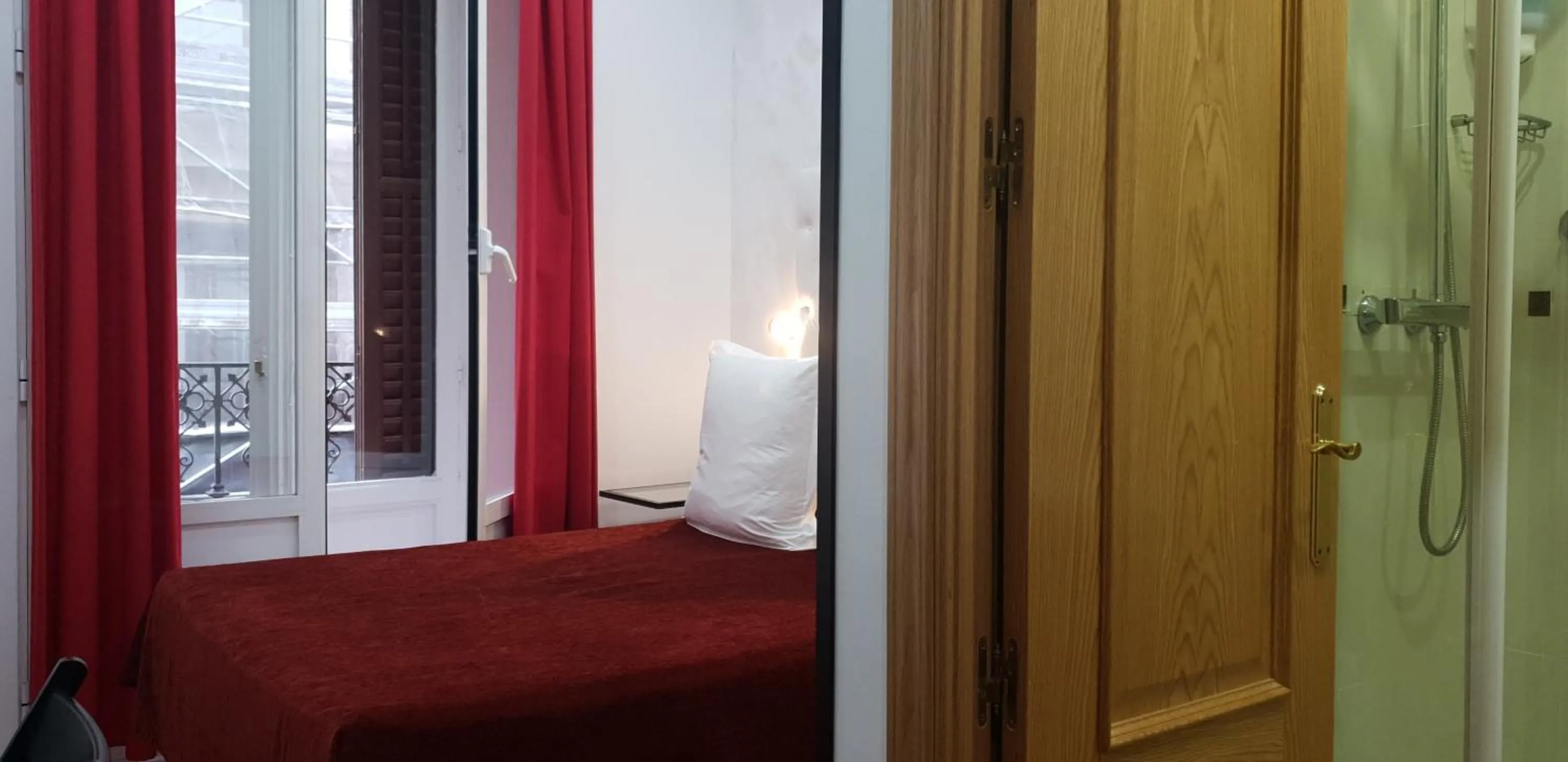 Photo of the whole room, Bed in Hostal Las Fuentes