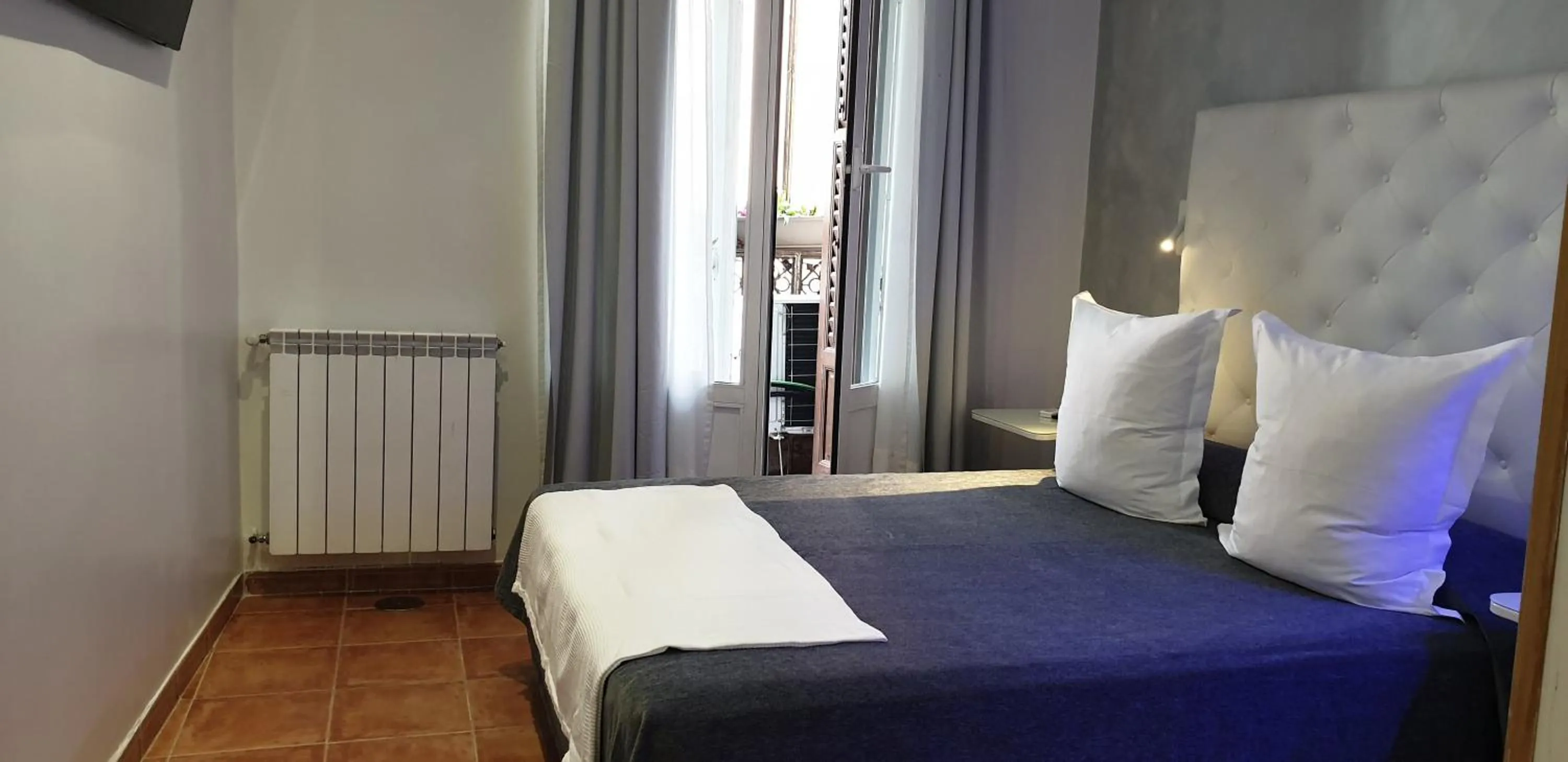 Photo of the whole room, Bed in Hostal Las Fuentes