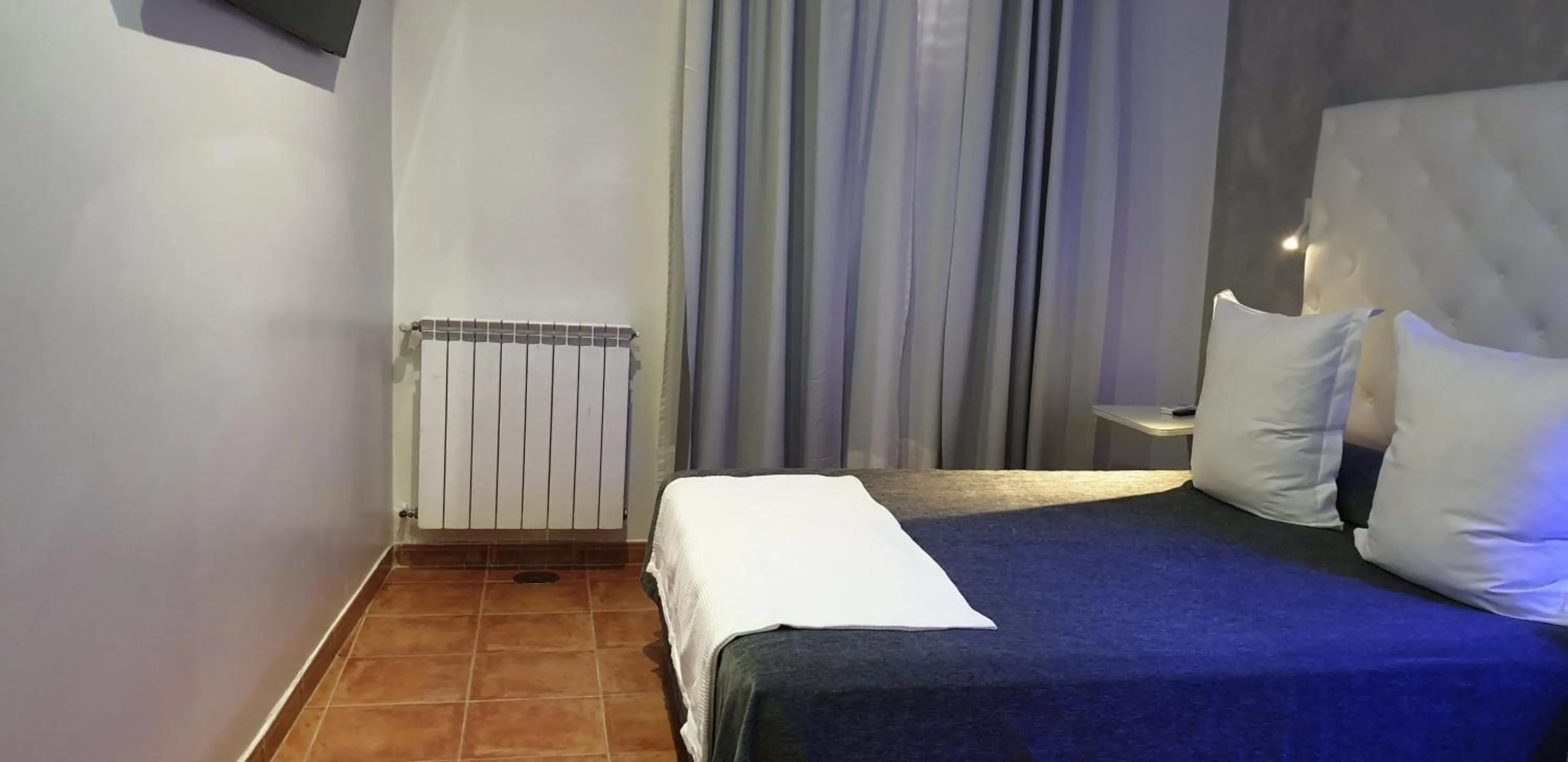 Bed in Hostal Las Fuentes