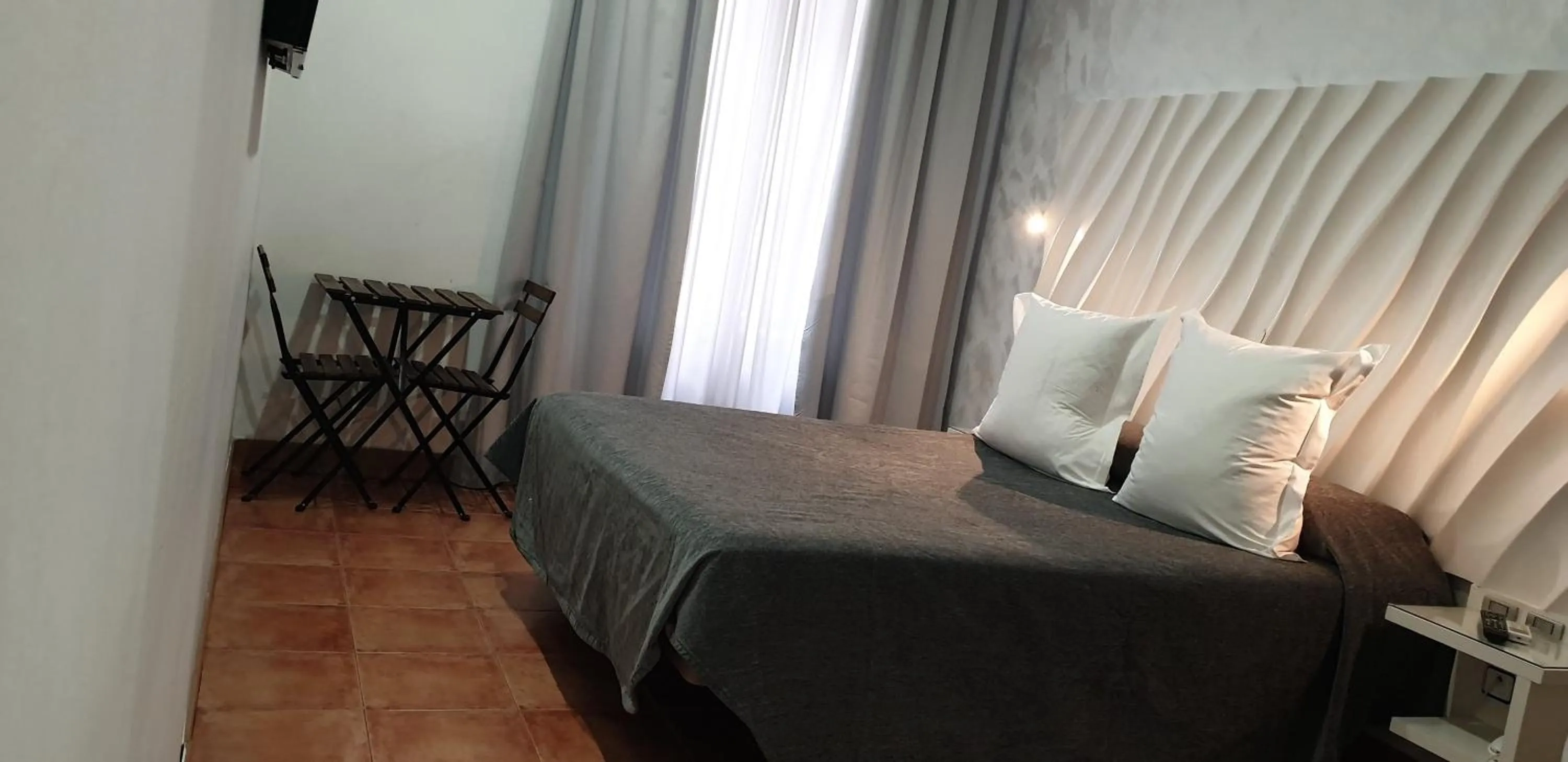 Photo of the whole room, Bed in Hostal Las Fuentes