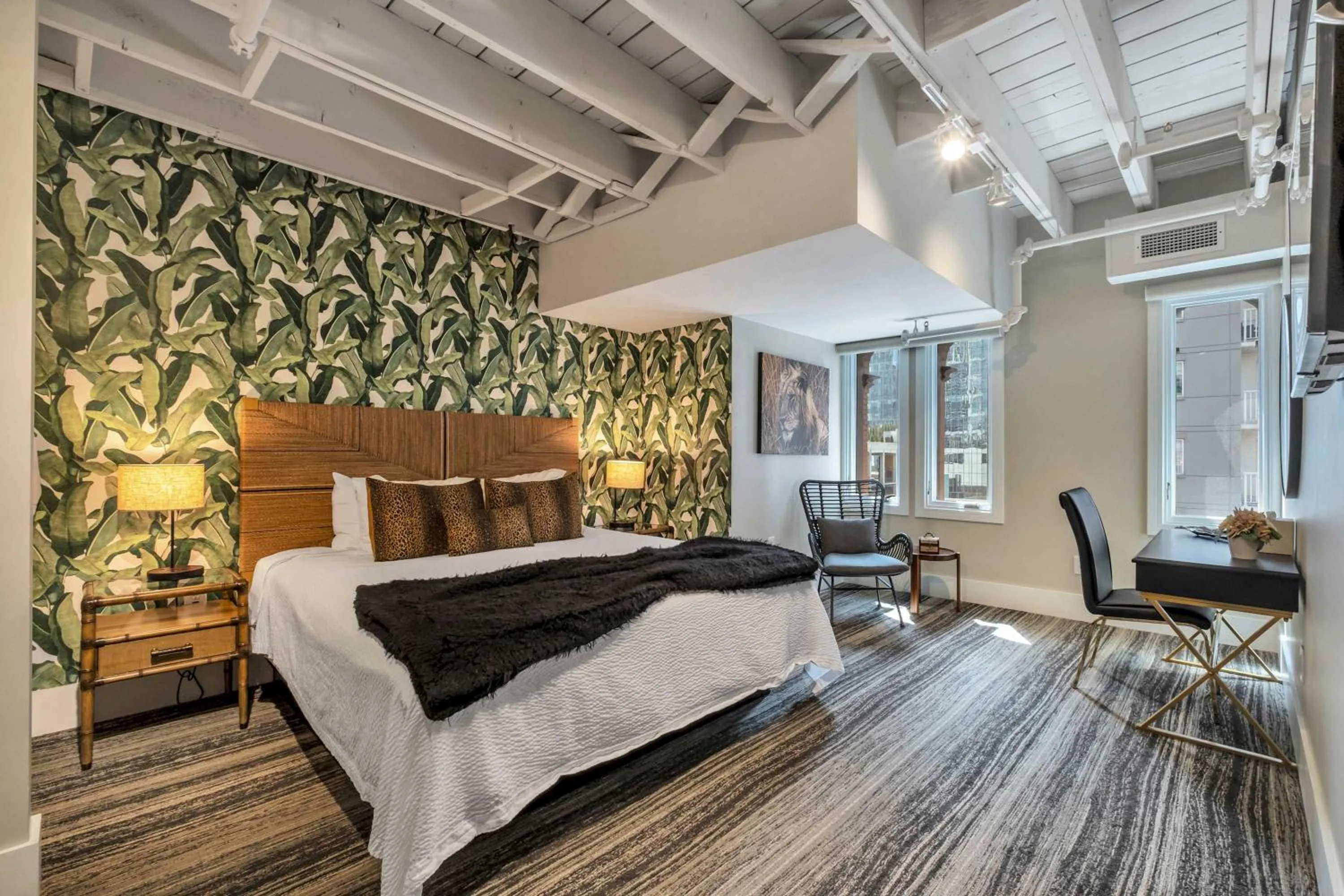 Bed in Skyline Suite with Penthouse & Rooftop Deck 6BR by Maddox Hotel